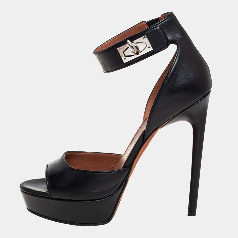 These black sandals from Givenchy are crafted from leather and feature open toes and 13 cm heels. They flaunt ankle straps that are detailed with a silver-tone shark tooth lock. Leather insoles and durable soles offer the right finish.

