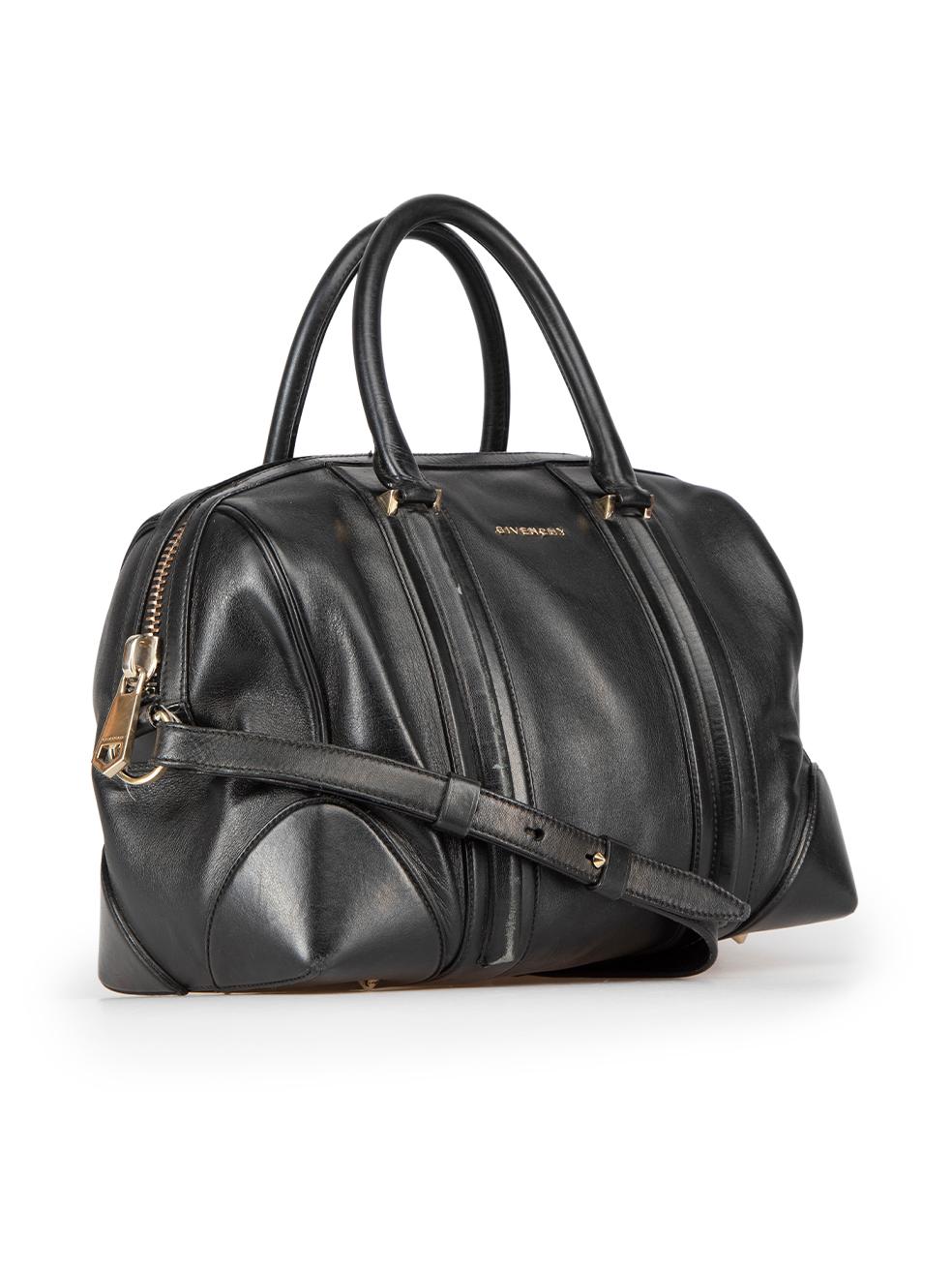 CONDITION is Good. General wear to bag is evident. Moderate signs of wear to leather exterior with noticeable abrasion found throughout, mild tarnishing of hardware components and edge paint cracking. Some stray thread ends can also be seen and