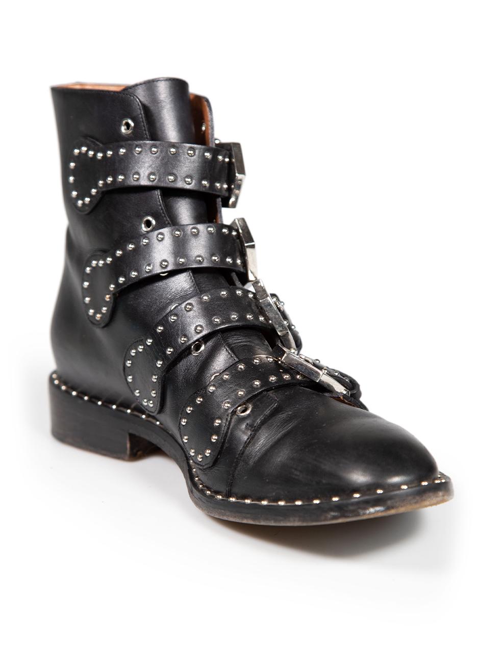 CONDITION is Very good. Minimal wear to boots is evident. Minimal wear to abrasion to rear of wooden sole as we as a tiny crack on the inner sides of both shoes. There is tarnishing to the buckles and discolouration to the insole can be seen on this