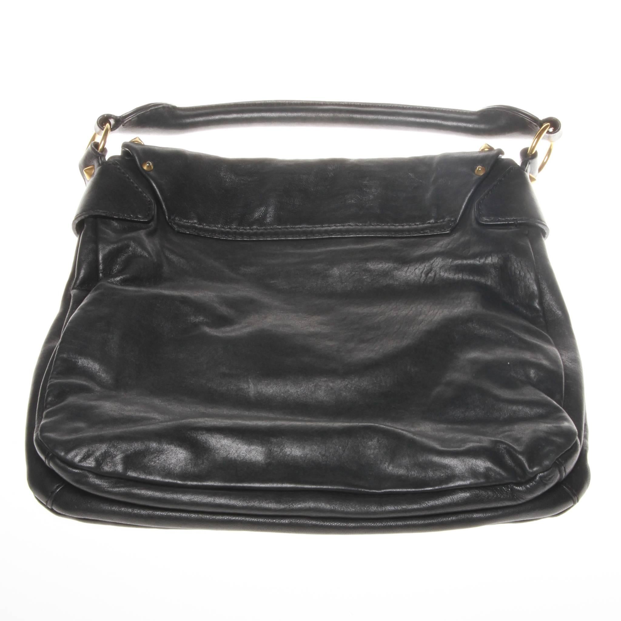 Authentic GIVENCHY limited edition black leather studded shoulder bag- immaculate condition, rarely used & stored in dust bag. All hardware/details in perfect condition, no scratches or discolouration on gold hardware, interior of bag also perfect