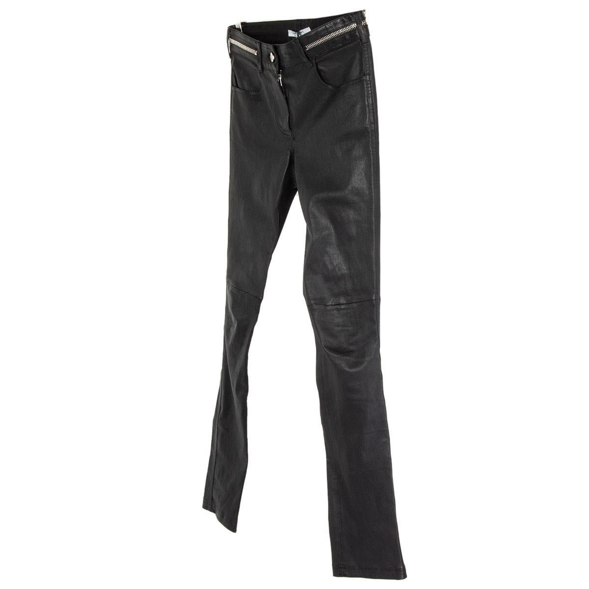 authentic Givenchy pants in black lambskin leather (100%) with zipper detail on the waist-line and at the hem on the back. Closes with one button and a zipper on the front. Lined in black cotton (95%) and elastane (5%). Has been worn and is in