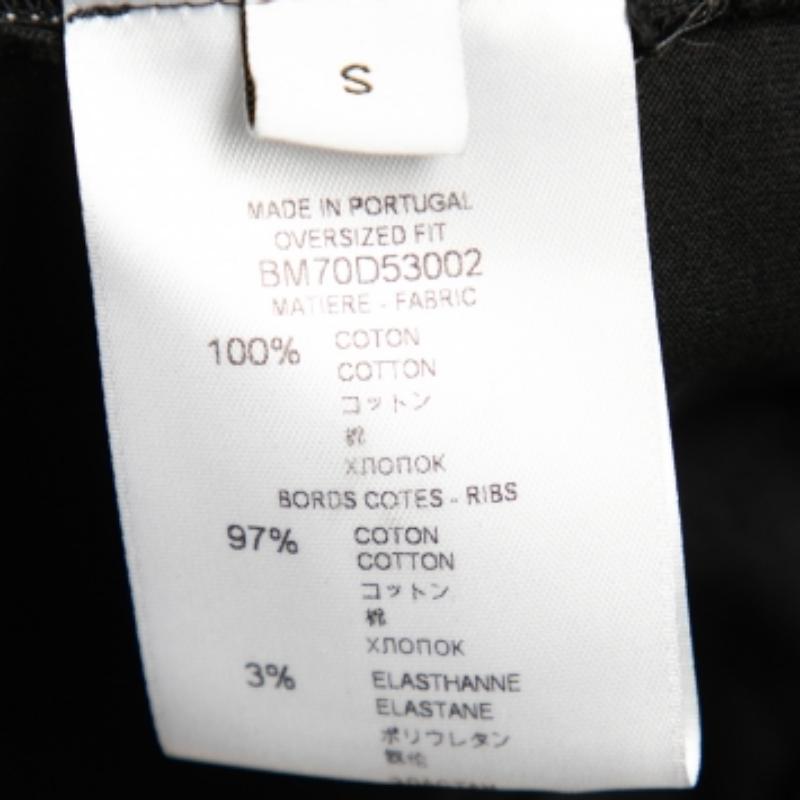 Givenchy - Maglietta nera con logo stampato e dettaglio di rifiniture laterali - T S In condizioni discrete in vendita a Dubai, Al Qouz 2
