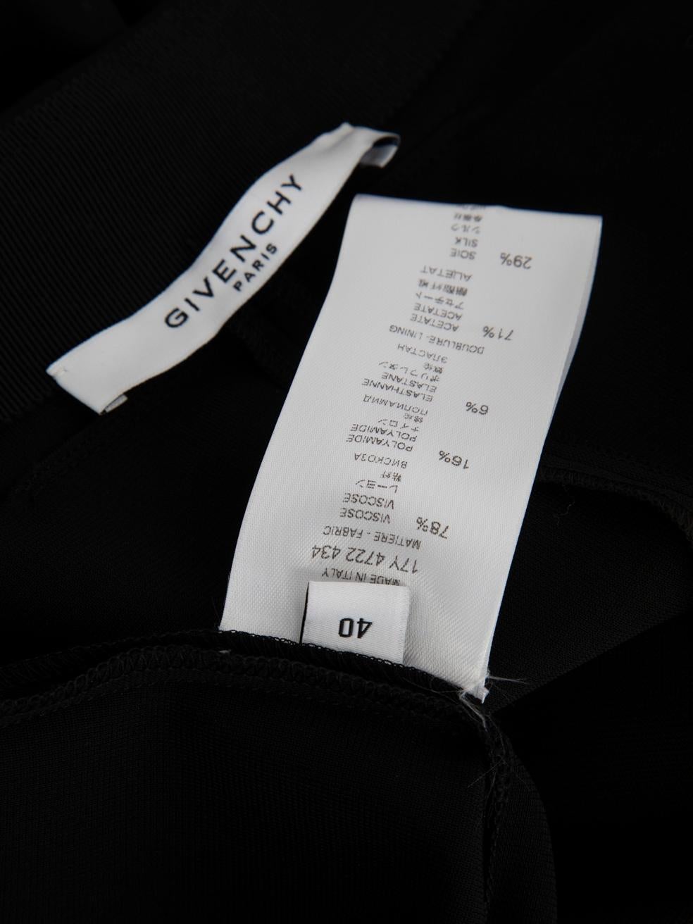 Givenchy, jupe midi noire bordée de volants, taille L Bon état - En vente à London, GB