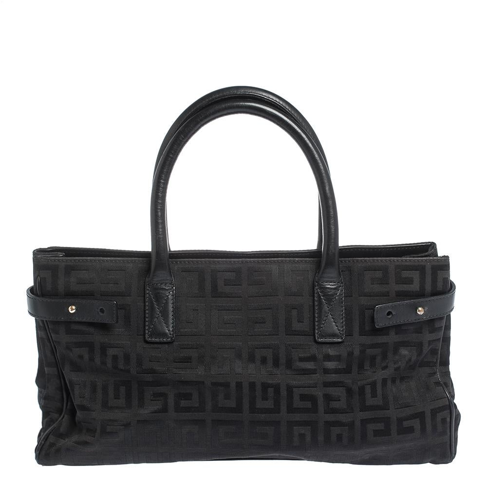 Flaunt this fantastic-looking tote from Givenchy and give yourself a sophisticated look. The bag is held by dual handles and crafted from Monogram canvas and leather. It comes with a nylon interior that is secured by a buttoned closure. The tote