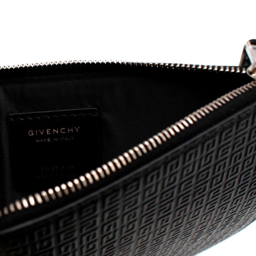 Givenchy Black Monogram Embossed Leather Mini Pouch For Sale 1