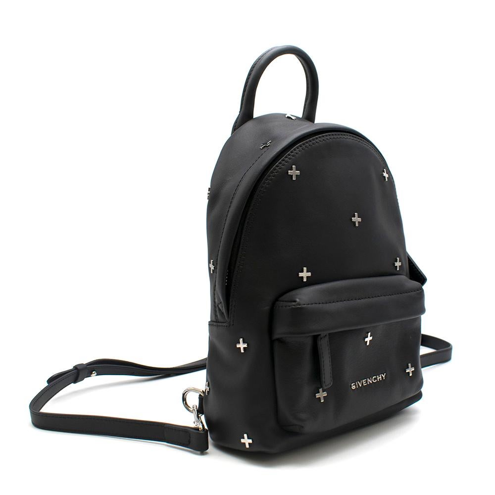 Givenchy Black Nano Cross Stud Backpack

- Cross stud embellishment
- Silver hardware
- Front zip pocket
- Detachable straps

Please note, these items are pre-owned and may show signs of being stored even when unworn and unused. This is reflected