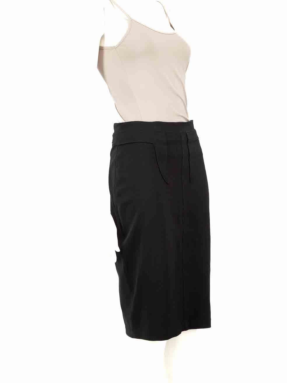 CONDITION is Very good. Hardly any visible wear to the skirt is evident. However, the sizing and composition label is missing on this used Givenchy designer resale item.
 
 
 
 Details
 
 
 Black
 
 Synthetic
 
 Pencil skirt
 
 Knee length
 
