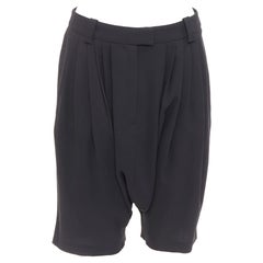GIVENCHY black pleated front drop crotch harem knee length shorts FR38 M