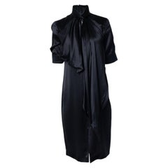 Givenchy, black silk dress with bow