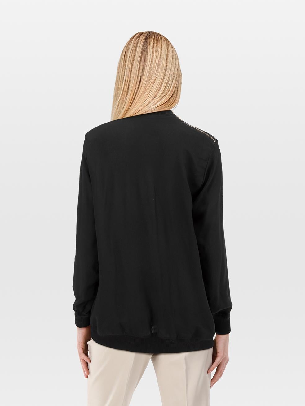 CONDITION is Very good. Minimal wear to the top is evident. Plucks to the weave on the upper front. Discolouration on the front upper left, the right sleeve and under both armpits on the inside of this used Givenchy designer resale item.