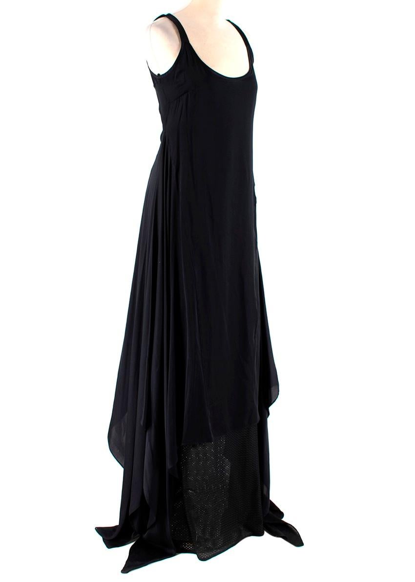 Givenchy Black Silk Satin Asymmetric Maxi Dress

-Luxurious soft silk satin texture 
-Mesh lining that shows as a detail to the hem 
-Flared asymmetrical skirt 
-Zip fastening to the side 
-Triangle panels as darts 
-Round neckline 
-Midi length
