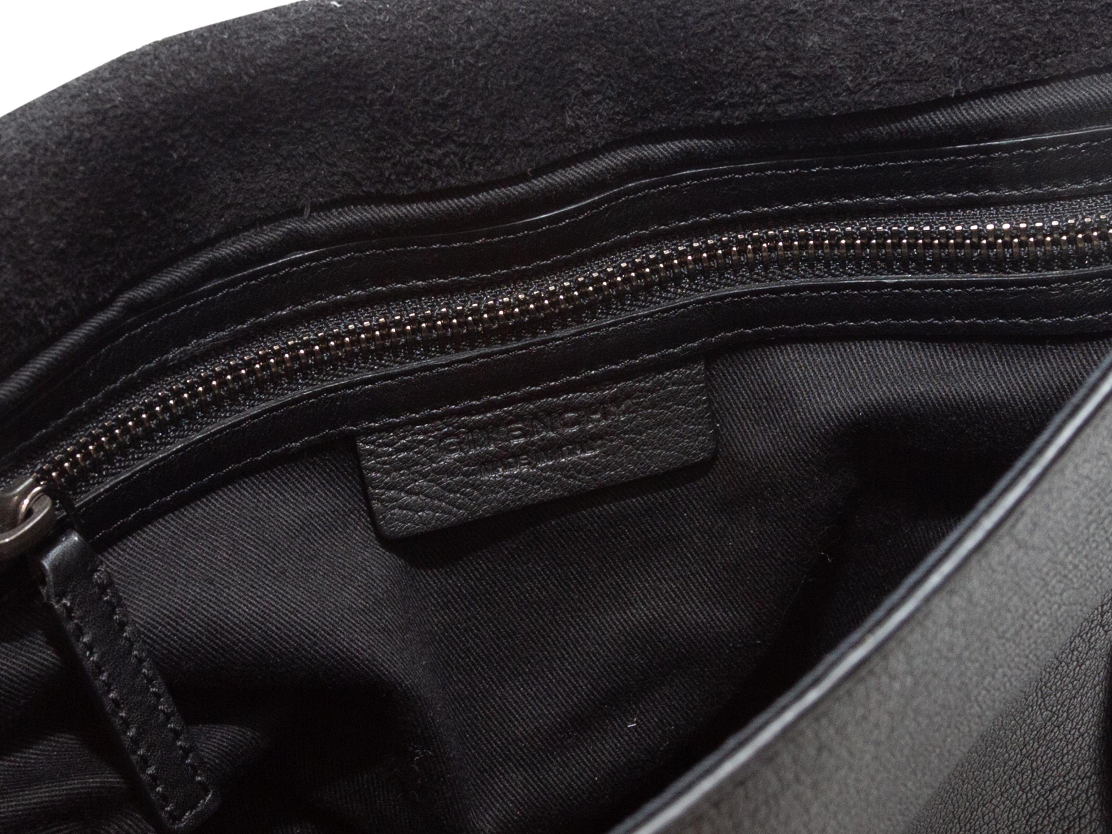 Product details: Black soft leather Obsedia crossbody bag by Givenchy. Interior zip pocket. Silver-tone hardware. Adjustable shoulder strap. Magnetic closure pocket at exterior back. Flap closure at front. 12.5