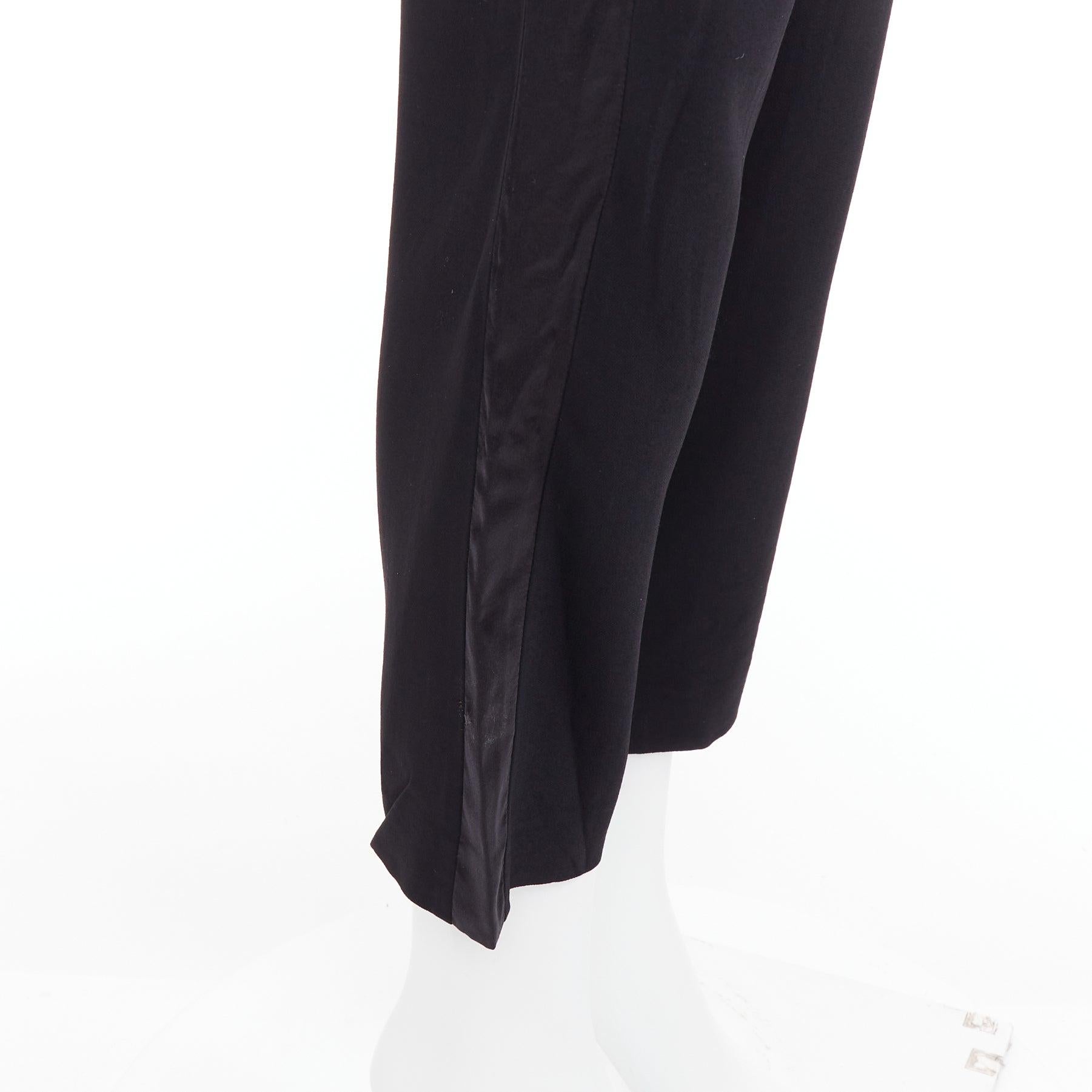 GIVENCHY - Pantaloni svasati neri con stelle applicate in seta FR34 XS in vendita 2