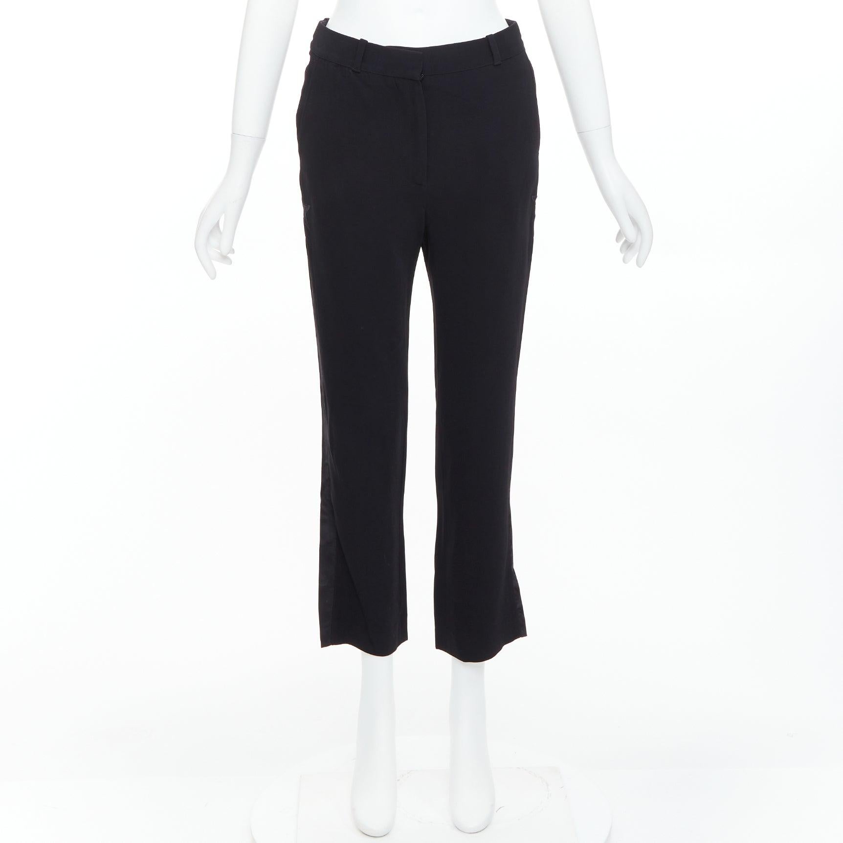 GIVENCHY - Pantaloni svasati neri con stelle applicate in seta FR34 XS in vendita 4