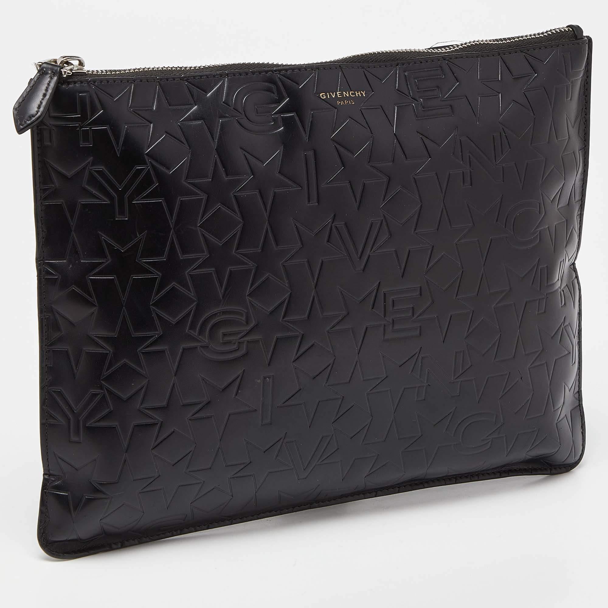 Givenchy Black Star Embossed Leather Zip Clutch In Good Condition For Sale In Dubai, Al Qouz 2