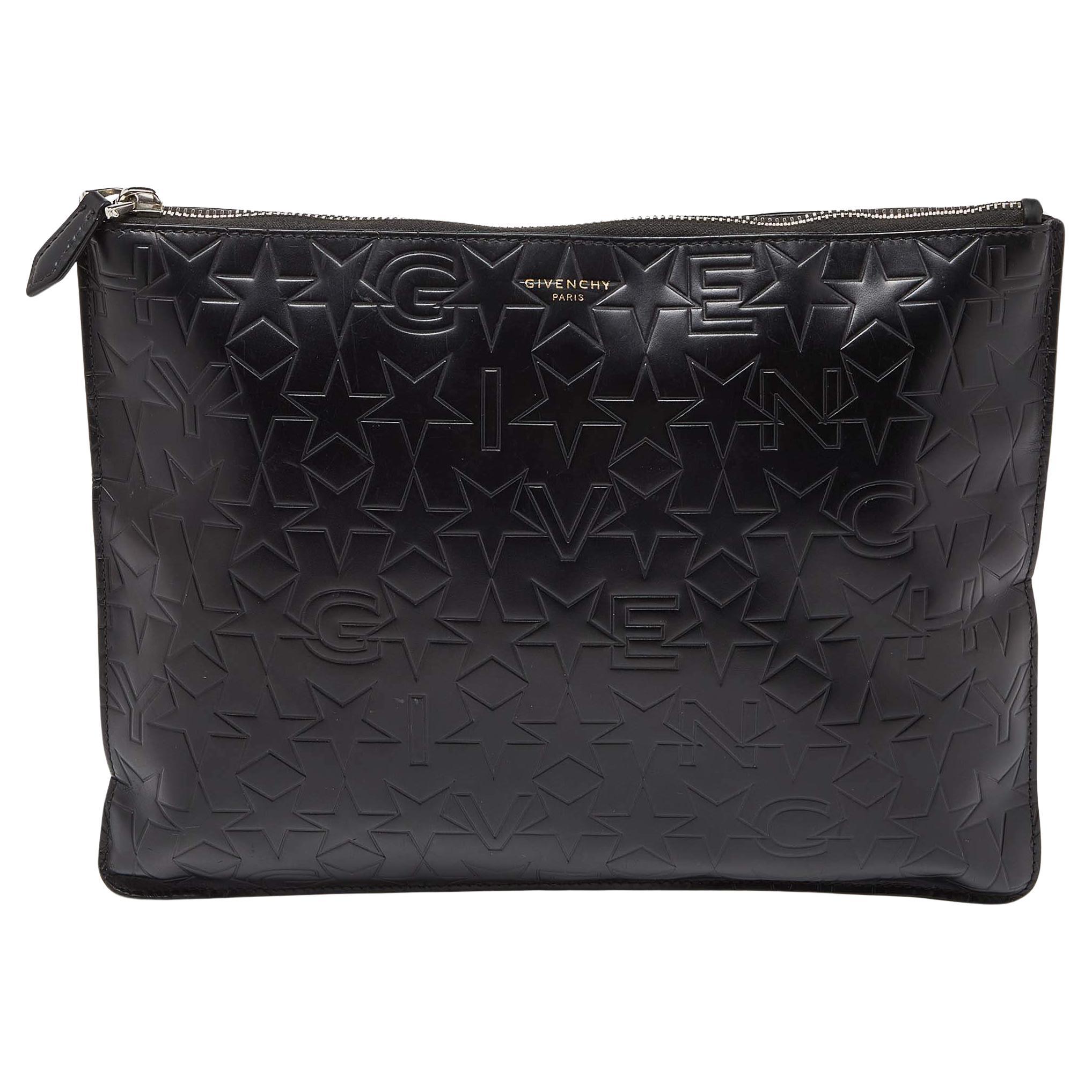 Givenchy Black Star Embossed Leather Zip Clutch For Sale