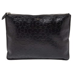 Used Givenchy Black Star Embossed Leather Zip Clutch