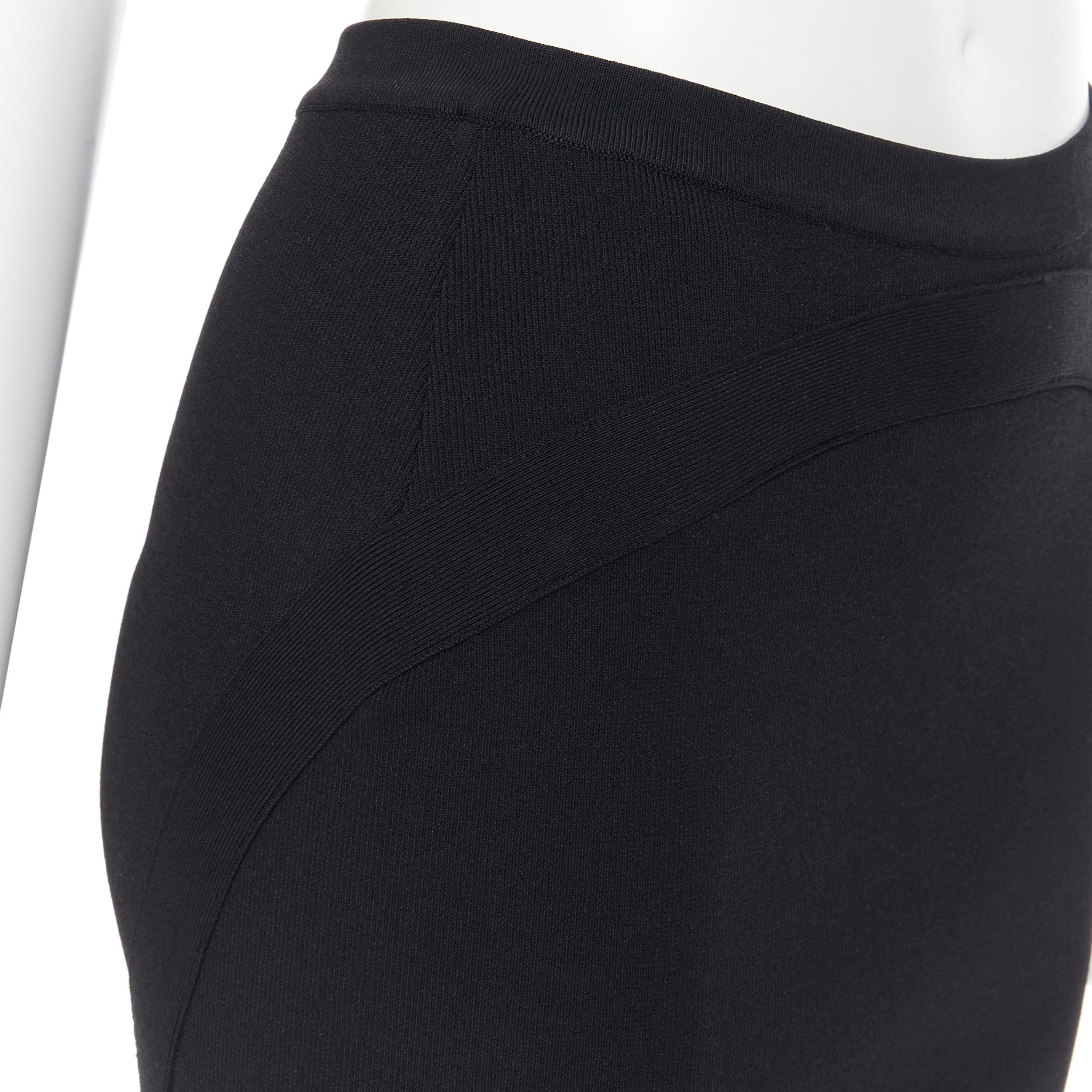 GIVENCHY black viscose knit curved circular trimming stretch pencil skirt S 
Reference: LNKO/A01762 
Brand: Givenchy 
Designer: Riccardo Tisci 
Material: Viscose 
Color: Black 
Pattern: Solid 
Closure: Zip 
Extra Detail: Stretch fit. Side zip