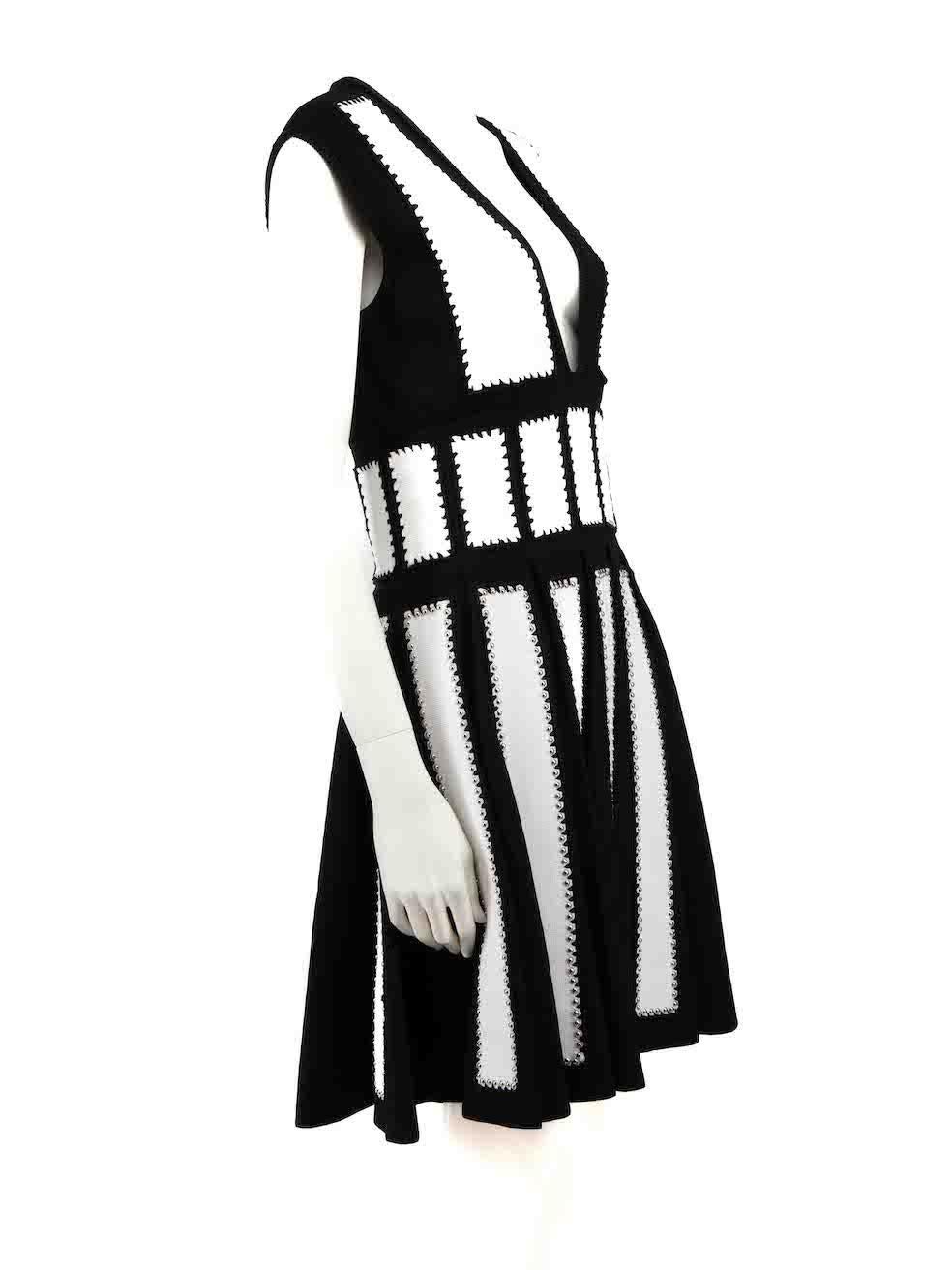 CONDITION is Very good. Hardly any visible wear to dress is evident on this used Givenchy designer resale item.
 
 
 
 Details
 
 
 Black and white
 
 Viscose
 
 Knit dress
 
 Striped pattern
 
 Plunge neck
 
 Sleeveless
 
 Silver studded detail
 
