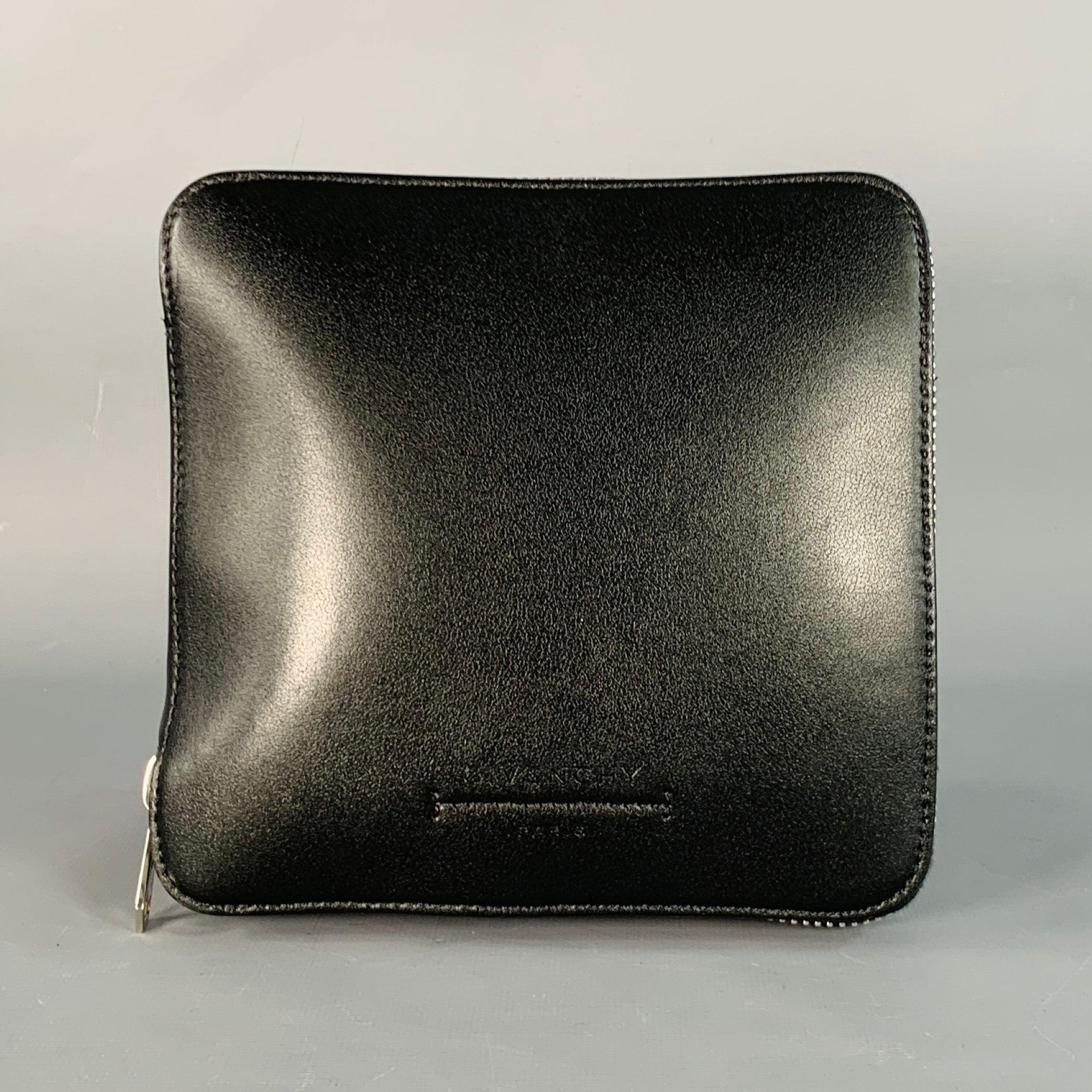 GIVENCHY tote bag
in a black nylon featuring white logo print with logo tape top handles, and packable design with zip closure.Very Good Pre-Owned Condition. Minor signs of wear. 

Measurements: 
  Length: 15 inches Width: 7 inches Height: 15.5