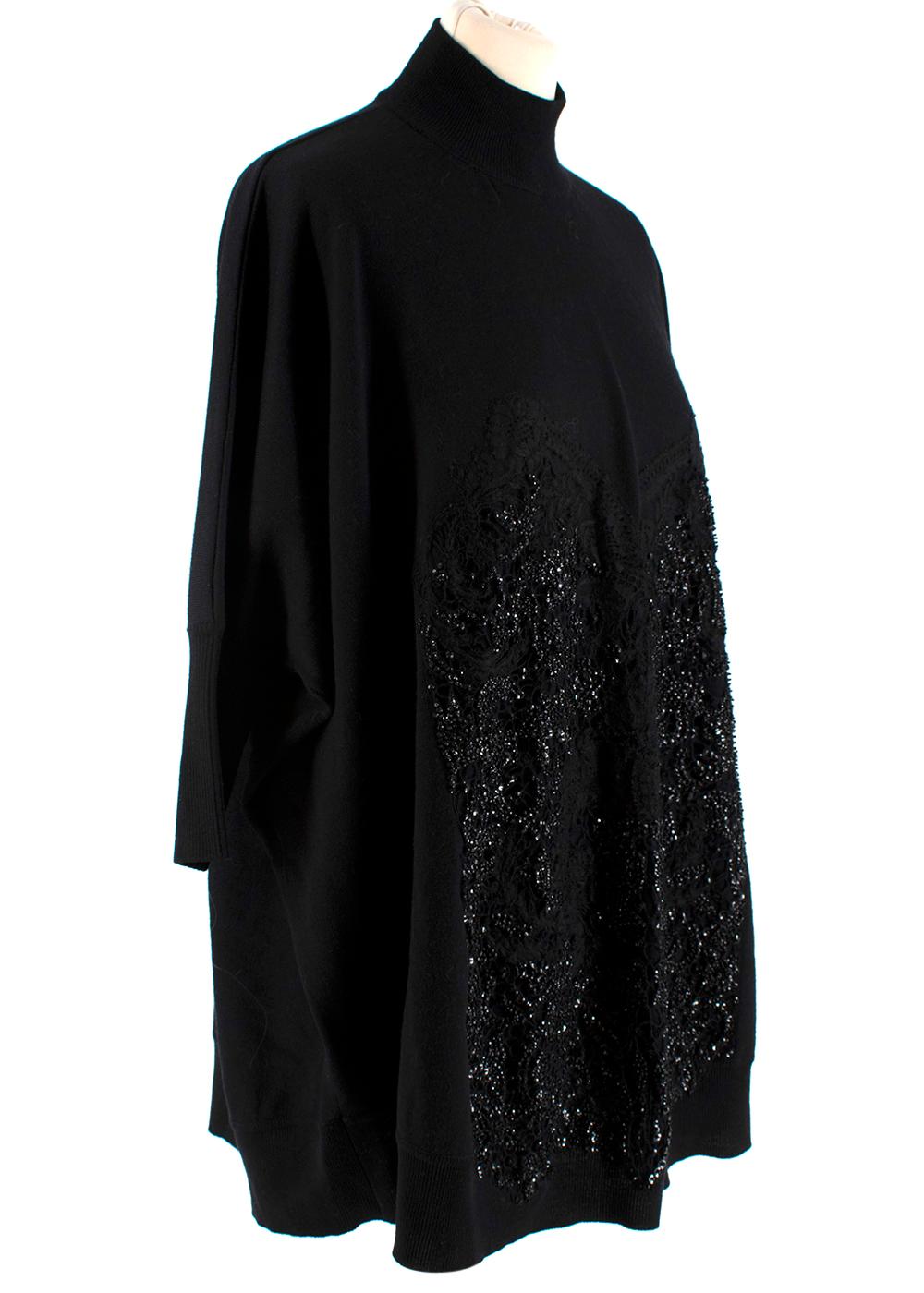 Givenchy Black Wool Beaded Bustier Oversized Knit Sweater

- Made of soft lightweight wool 
- Beaded lace bustier like motif to the front 
- Oversized cut 
- Ribbed cuffs and hem 
- Raised neck 
- Neutral, easy to style black hue 
- Versatile