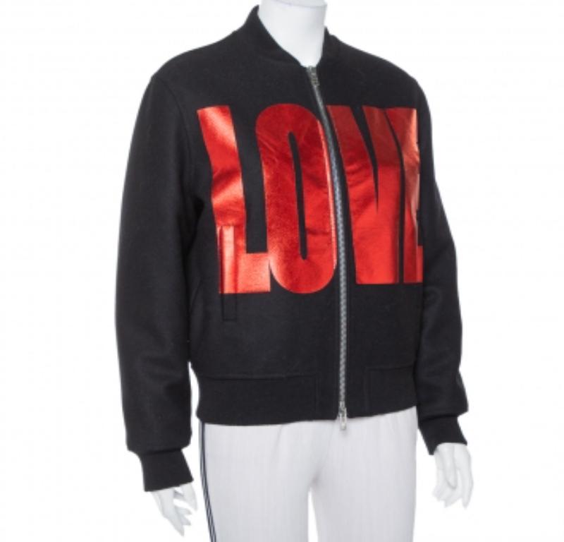 Reflecting urban style and effortless dressing, this bomber jacket from Givenchy is just perfect! The black wool creation has been designed with a contrasting 'LOVE' print on the front. It comes equipped with a zip closure and long sleeves and can