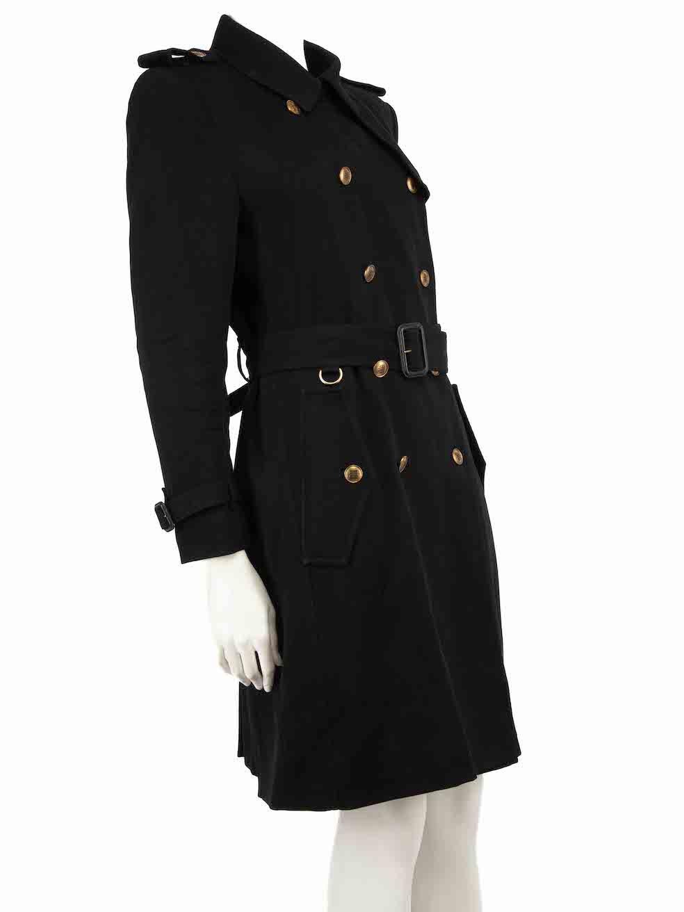 CONDITION is Very good. Minimal wear to coat is evident. Minimal wear to the right-side bust lining with light plucks to the weave on this used Givenchy designer resale item.
 
 
 
 Details
 
 
 Black
 
 Wool
 
 Coat
 
 Double breasted
 
 Gold