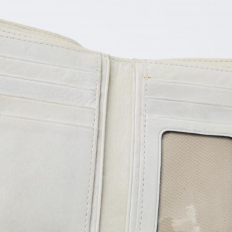 Donna Portafoglio compatto in tela e pelle con patta metallica Givenchy blu/crema Monogram in vendita