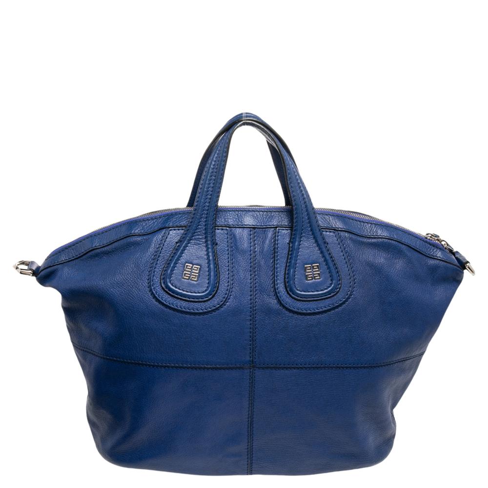 The Nightingale tote by Givenchy is a classy piece of accessory that will be just perfect for the office. Crafted from polished blue leather, the tote has a spacious canvas-lined interior. Givenchy’s iconic logo adorns the base of the handles. The