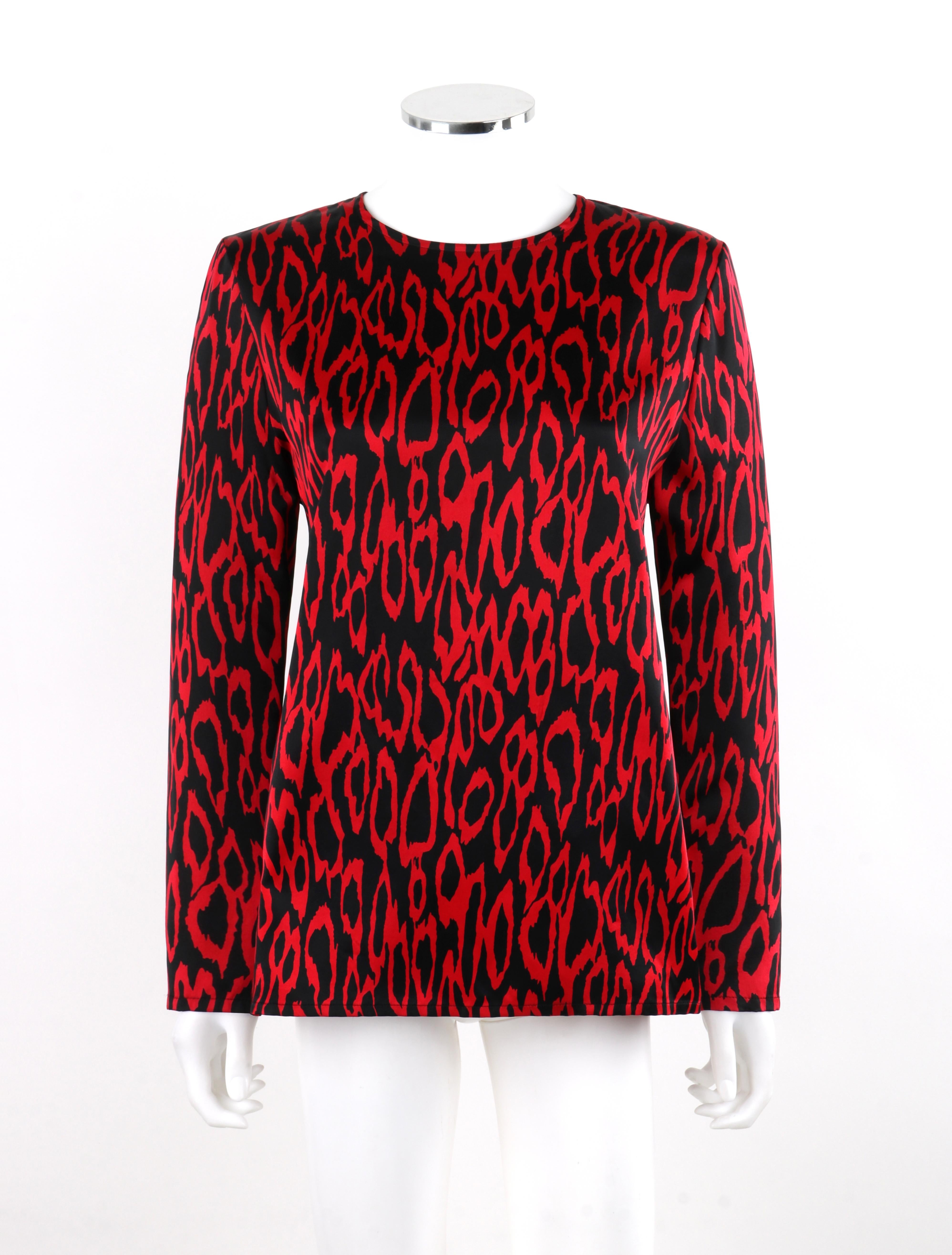 GIVENCHY Boutiques c.1980's Red Black Abstract Print Silk Long Sleeve Blouse Top

Brand / Manufacturer: Givenchy
Circa: 1980s
Designer: Givenchy
Style: Long sleeve blouse
Color(s): Shades of red, black
Lined: No
Marked Fabric Content: 
