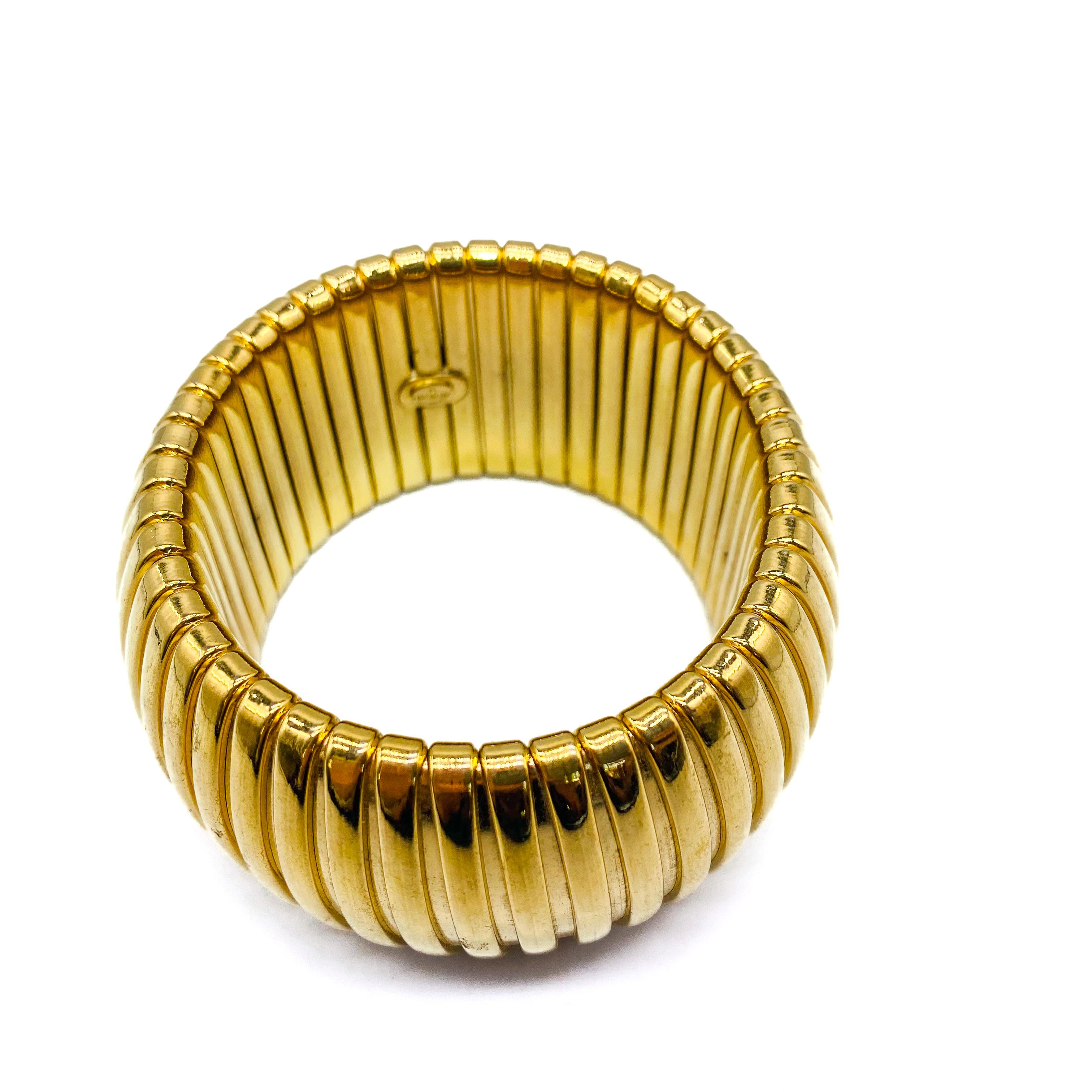 Givenchy Vintage 1980s Cuff Bracelet
Super cool wide statement bracelet from the iconic house of Hubert du Givenchy

Detail
-Made in the US in the 1980s
-Crafted from a ridged gold plated metal
-Matching earrings also available

Size & Fit
-Measures