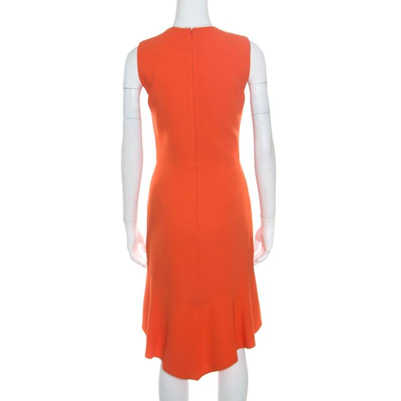 This bright orange dress from Givenchy is simply stunning! The sleeveless creation is made of a viscose blend and features an asymmetrical bottom hem detailing. It flaunts a round neckline and comes equipped with a concealed zip closure at the back.