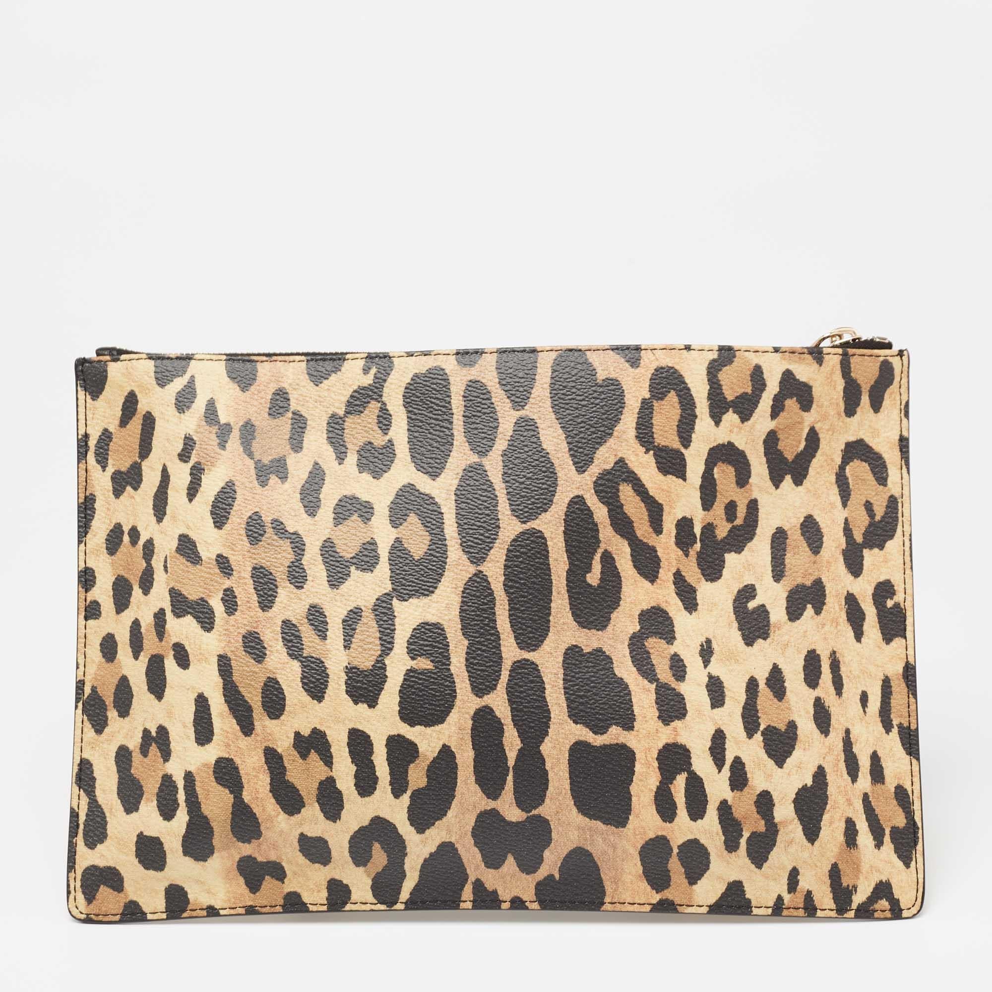 Organize your essentials in style with this Givenchy creation. The zip clutch has a leopard-print coated canvas outer and a zipper on top to secure the fabric interior.

Includes: Info Booklet, Original Dust Cloth, Original Box
