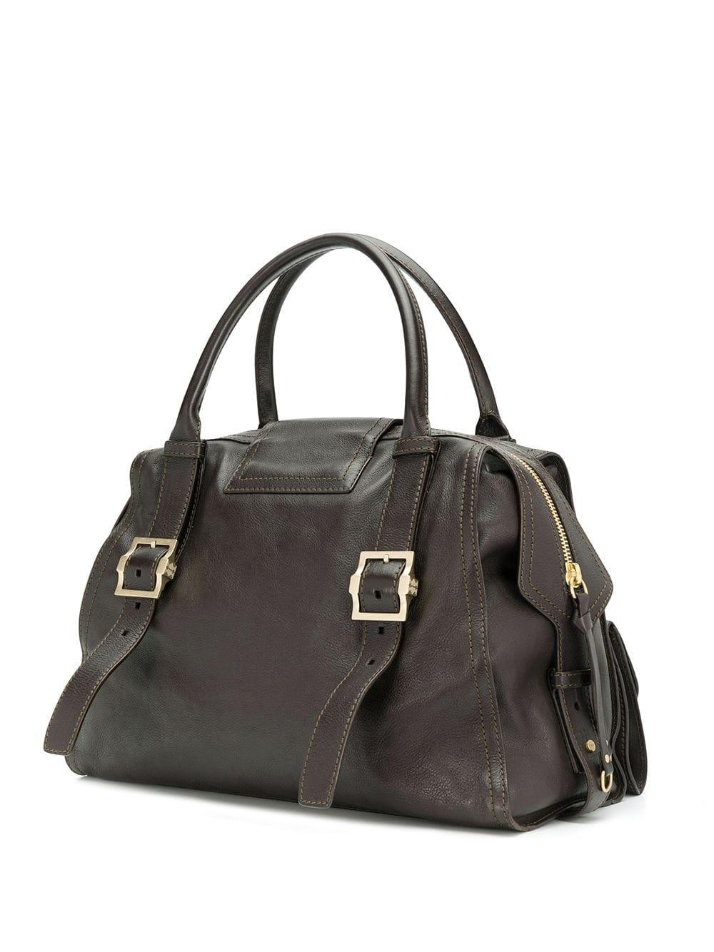 Crafted in dark brown leather, This pre-owned accessory by Givenchy is a sophisticated yet edgy take on the classic, structured shoulder and a basic essential that's as flexible and study as it is stylish. The medium sized piece is the perfect size