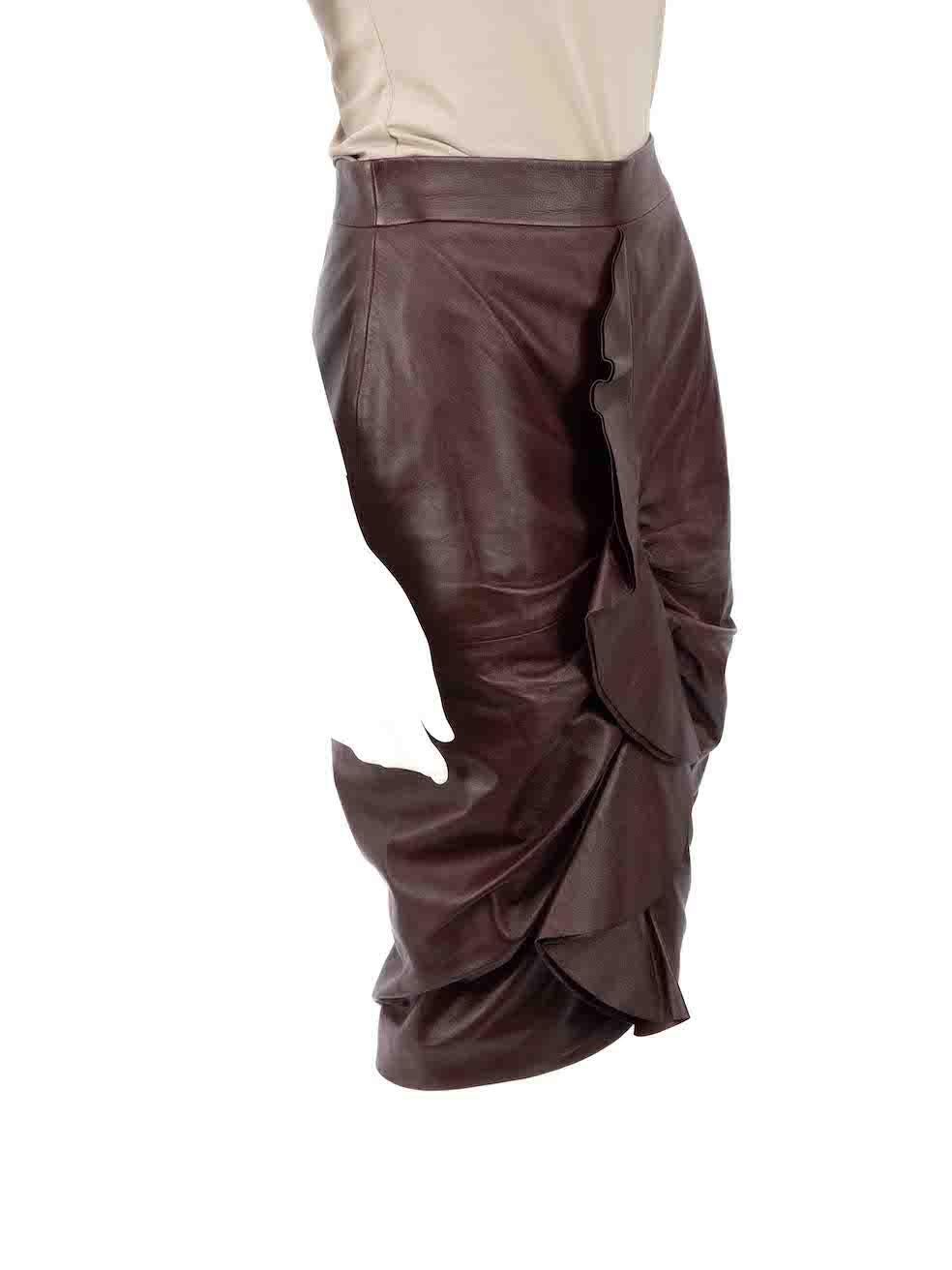CONDITION is Very good. Hardly any visible wear to skirt is evident on this used Givenchy designer resale item.
 
 
 
 Details
 
 
 Brown
 
 Leather
 
 Pencil skirt
 
 Ruffle accent
 
 Side zip and hook fastening
 
 Knee length
 
 Figure hugging