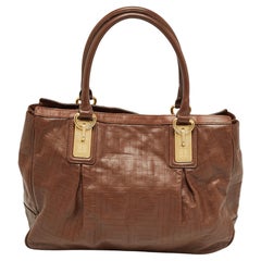 Givenchy Bolso de piel marrón con monograma en relieve