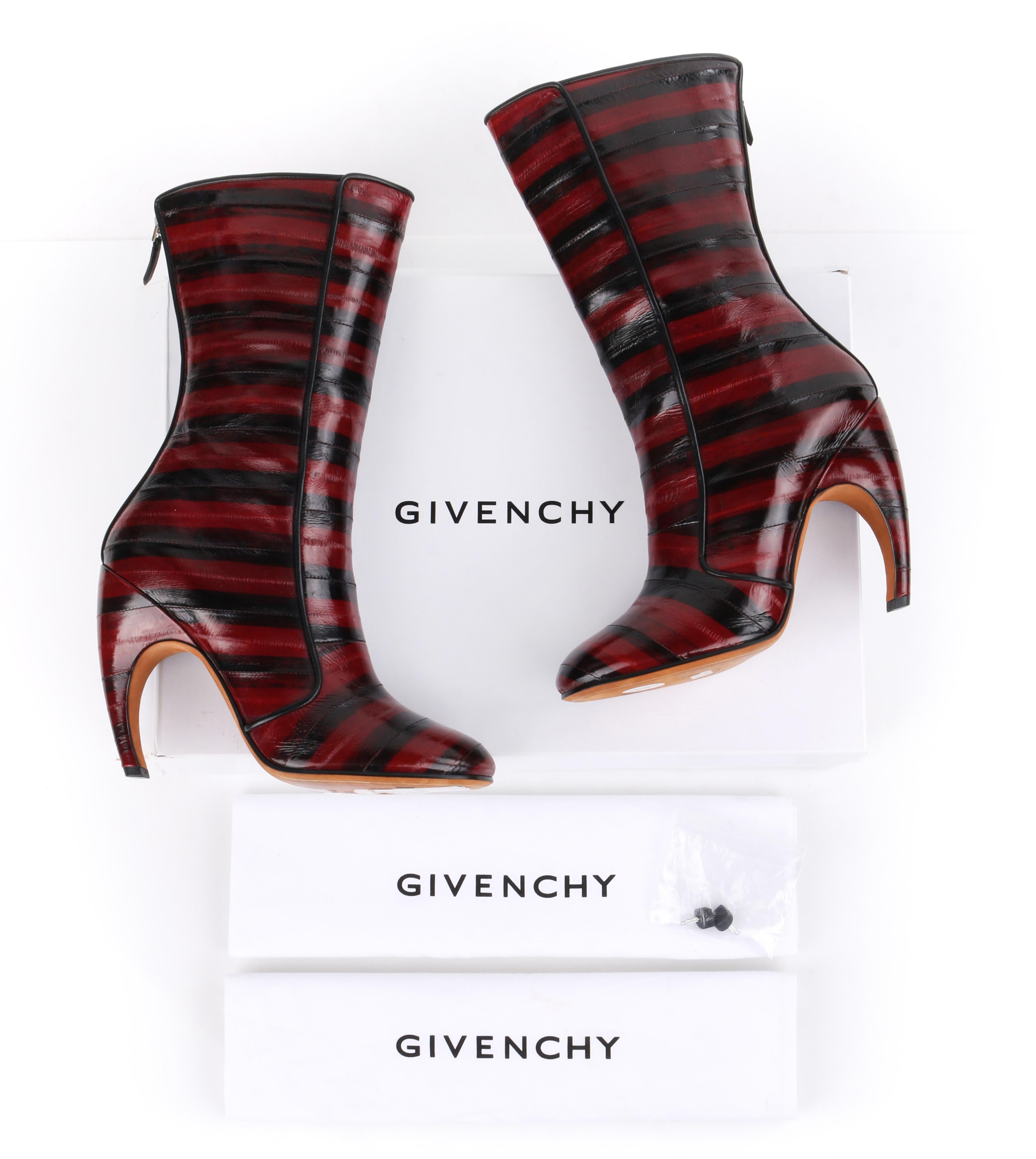 GIVENCHY Burgundy Black Stripe Eel Calf Skin Leather Zip Up Boots Heels
 
Estimated Retail: $1,550
 
Brand / Manufacturer: Givenchy
Designer: Clare Waight Keller
Style: Boots
Color(s): Shades of red and black
Unmarked Materials: Eel Skin (exterior);