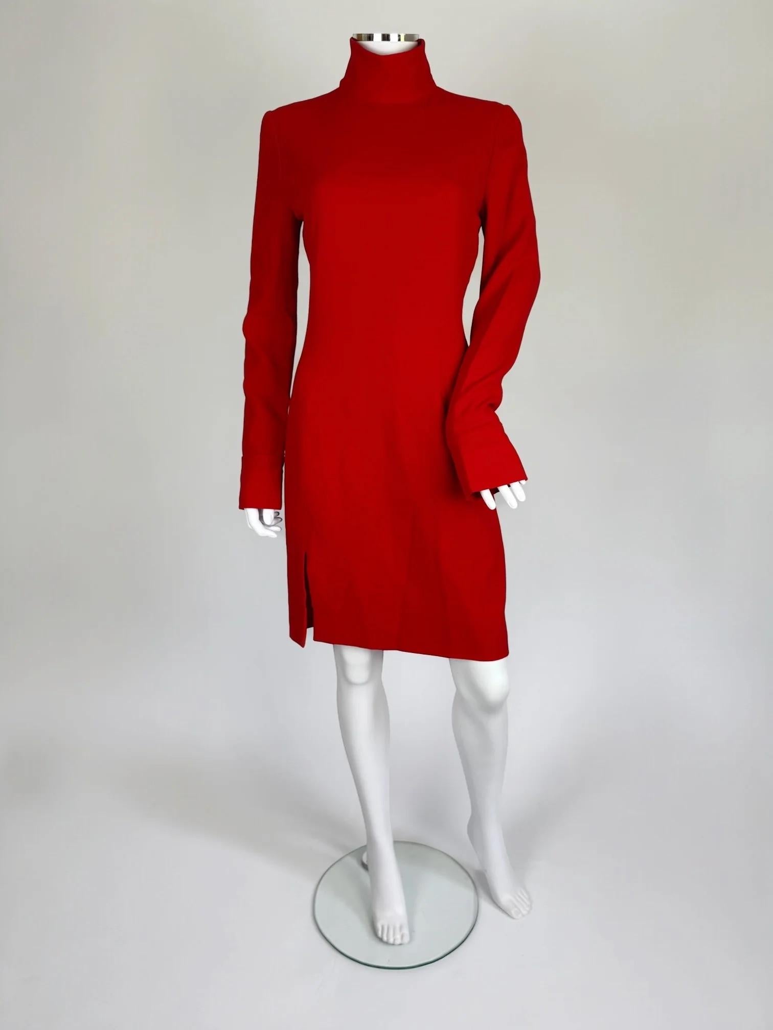 Givenchy by Alexander McQueen red wool dress, Fall Winter 1997
High mock turtleneck
Minimal design, straight cut
Features a small slit at thigh
Good vintage condition with some signs of wear to wool, a small split to seam in lining (not visible and