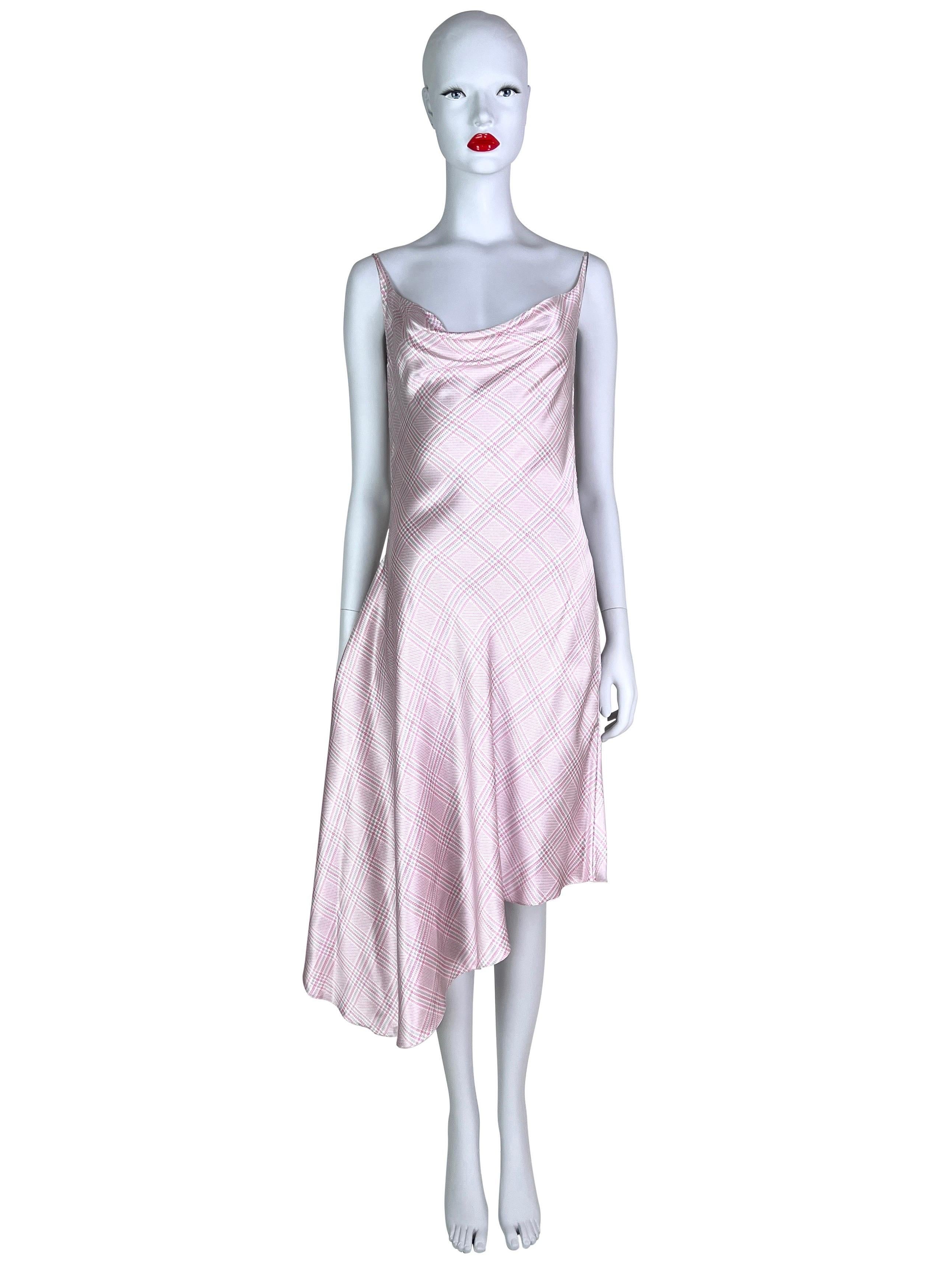 A gorgeous silk bias-cut dress from Alexander McQueen for Givenchy.

So FR 40, recommended for sizes US 0 through 6 or UK 4 through 10. Please be advised that this is a bias-cut, draped dress, so the measurements aren’t reflective of a fitting,