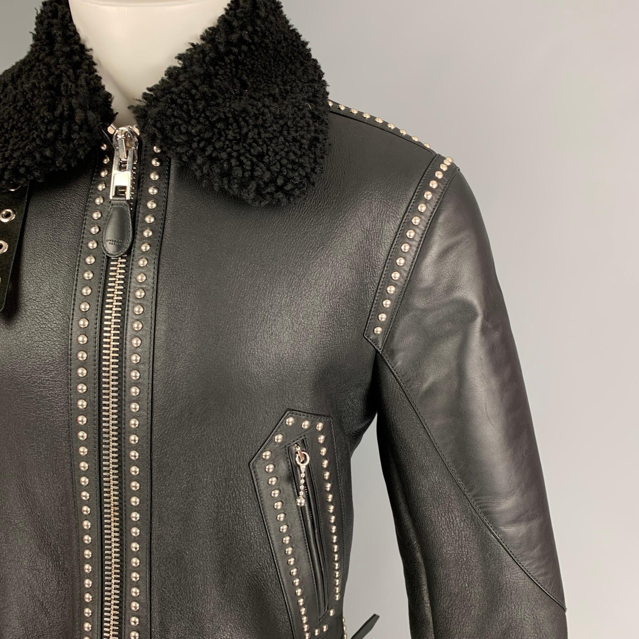 GIVENCHY by Ricardo Tisci FW 2017 jacket comes in a black leather featuring a blouson style, shearling collar, silver tone studded details, zipper pockets, side tab details, and a full zip up closure. 

New With Tags.
Marked: 48
Original Retail