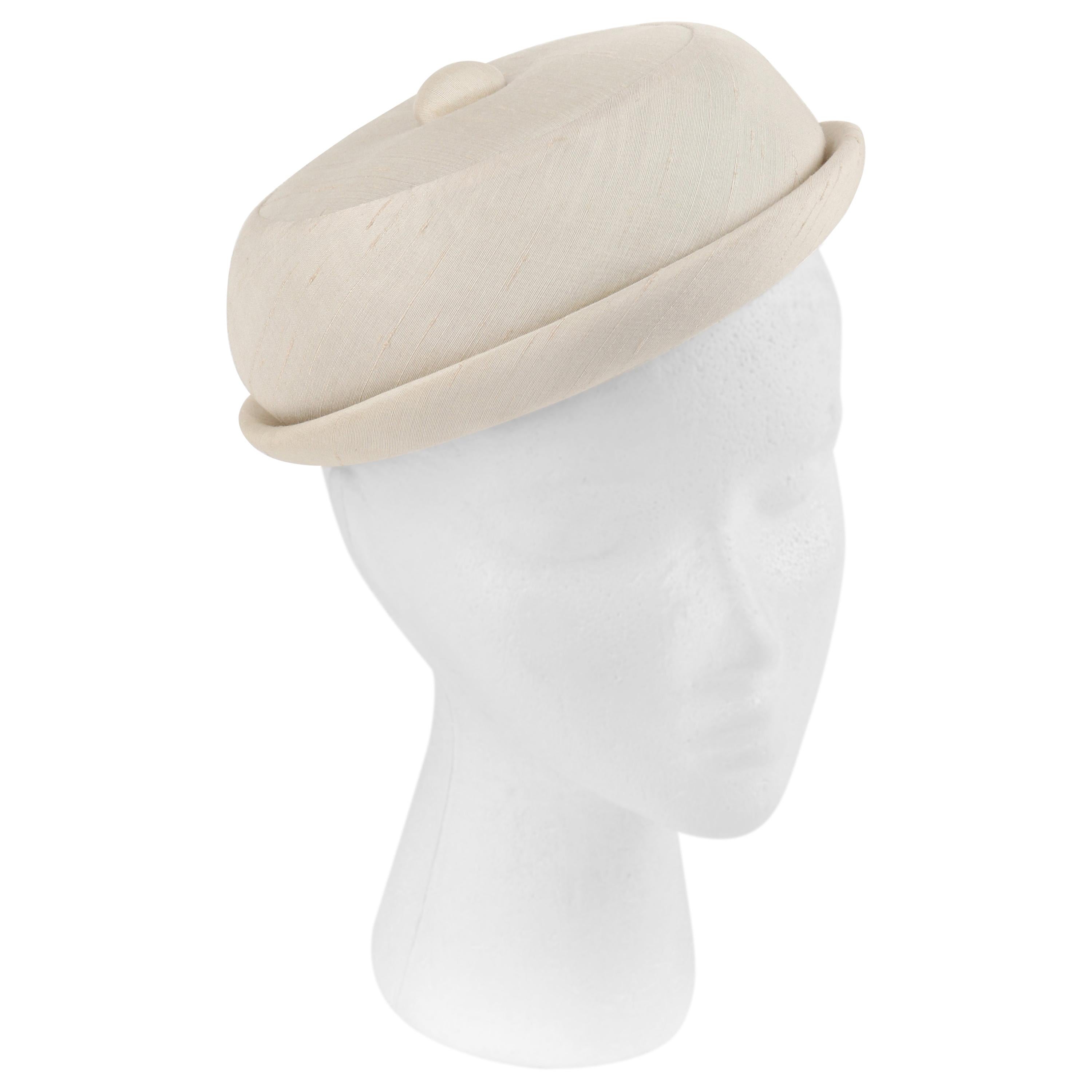 GIVENCHY c.1950's Solid Cream Silk Duponi Pillbox Style Detailed Button Top Hat