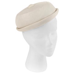GIVENCHY c.1950''s Solid Cream Silk Duponi Pillbox Style Detailed Button Top Hat