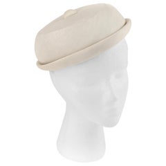 GIVENCHY c.1950's Solid Cream Silk Duponi Pillbox Style Detailed Button Top Hat