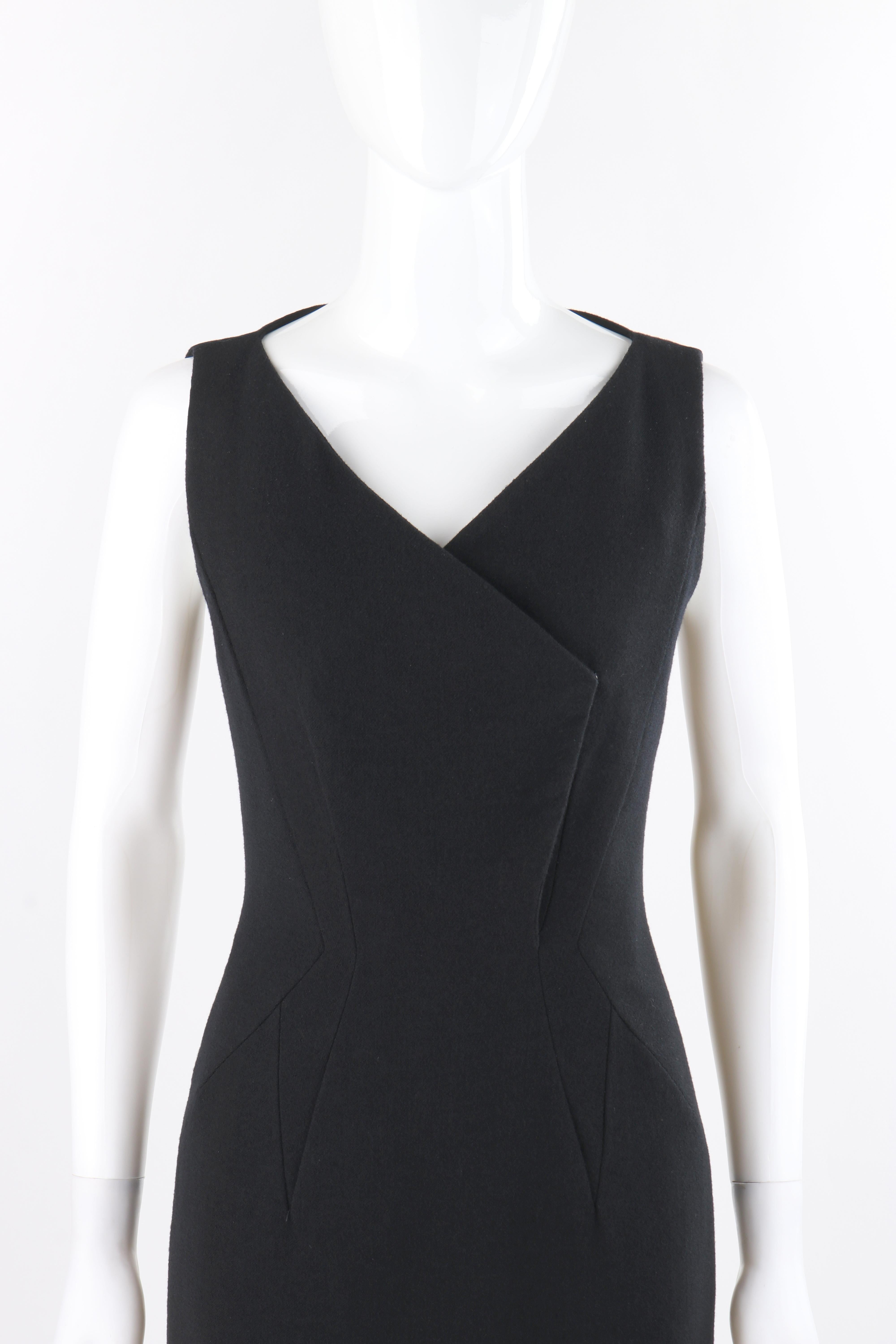 GIVENCHY c.2010's Black Tailored Geometric Panel Detail Sleeveless Sheath Dress
 
Brand / Manufacturer: Givenchy 
Circa: 2010’s
Style: Sleeveless sheath dress
Color(s): Black
Lined: Yes
Marked Fabric Content: “96% Wool, 4% elastane” (shell); “100%