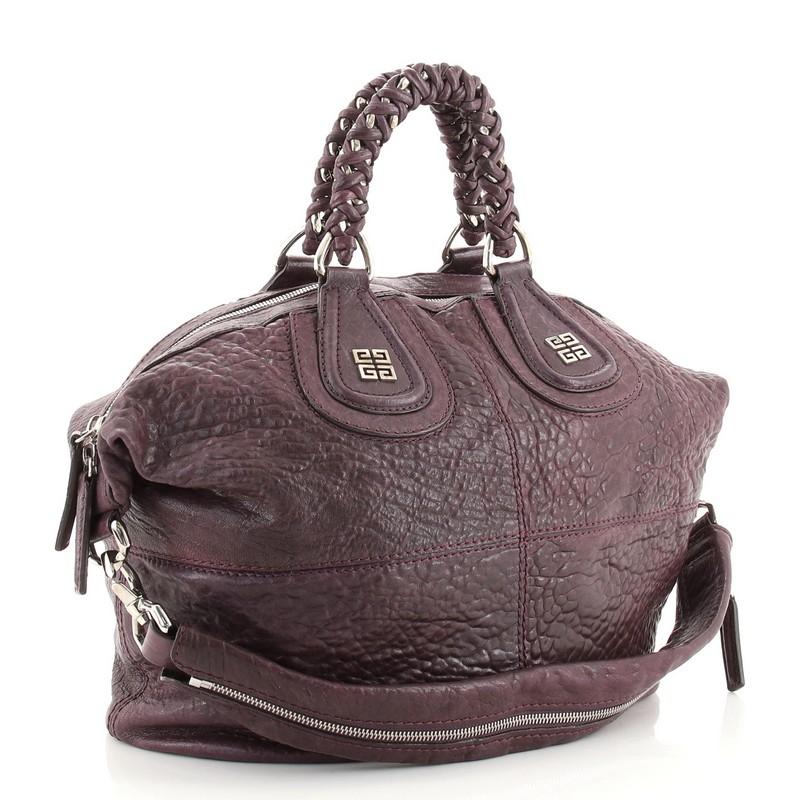 Condition: Fair. Odor in interior. Creasing, wear and scuffs on exterior and strap, moderate darkening and wear on handles, cracking on opening trim. Heavy splitting on strap base and interior zipper pull wax edges, wear and stains in interior,
