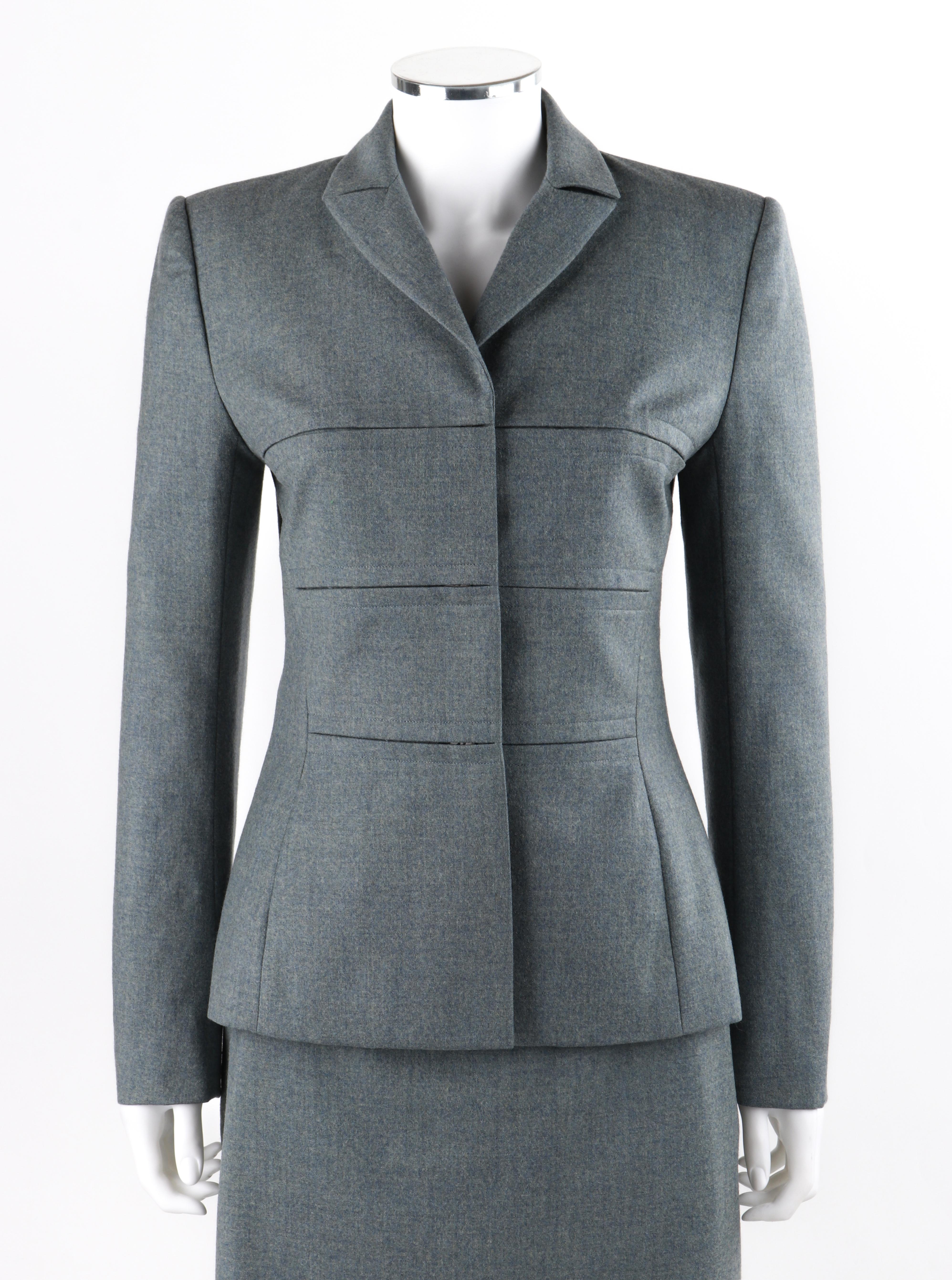 GIVENCHY Couture A/W 1998 ALEXANDER McQUEEN Blue Gray Tailored Blazer Skirt Suit
 
Brand / Manufacturer: Givenchy
Collection: A/W 1998
Designer: Alexander McQueen
Style: Tailored blazer jacket; tailored sheath skirt
Color(s): Shades of