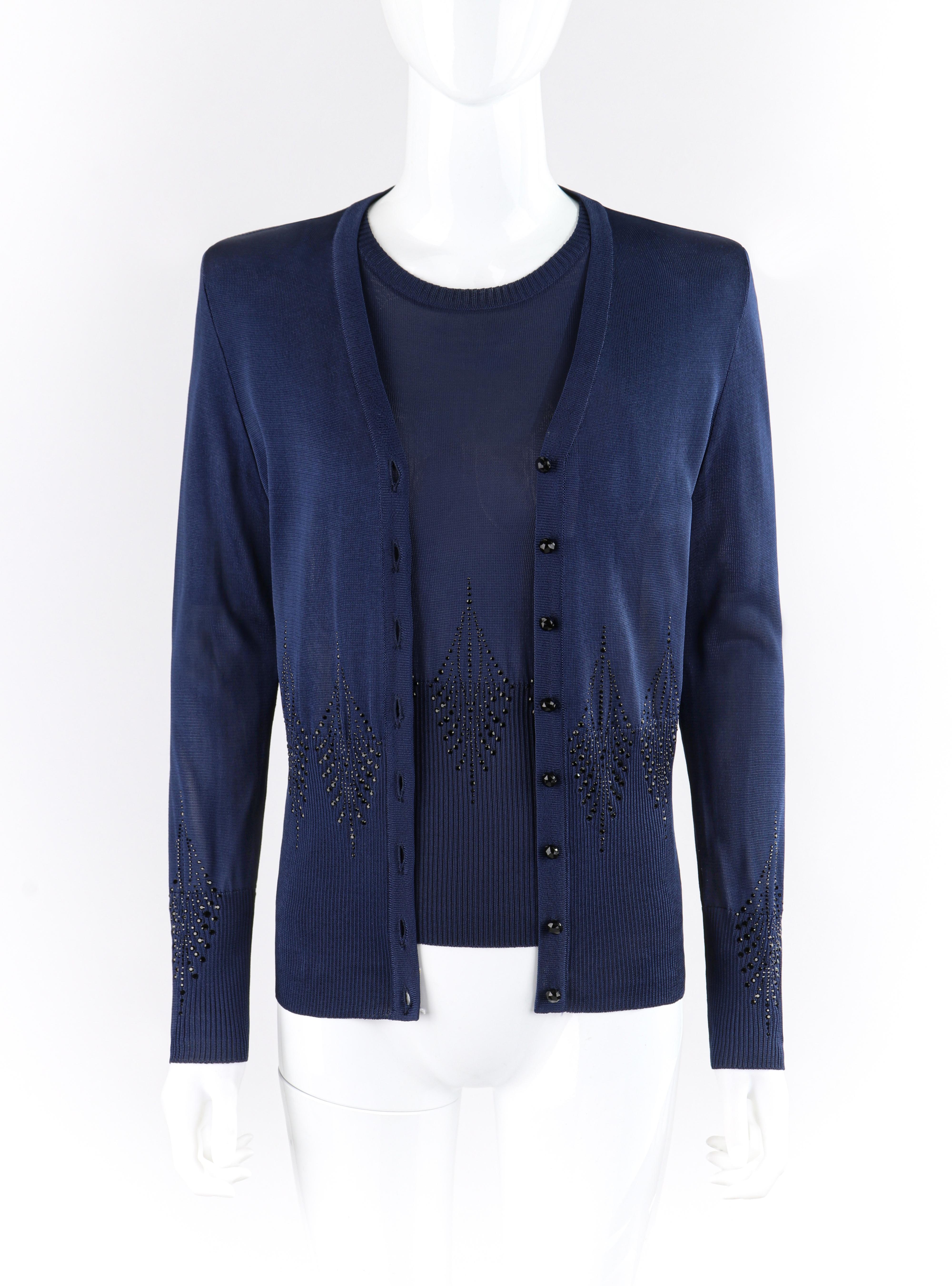 GIVENCHY Couture A/W 1998 ALEXANDER McQUEEN Embellished Knit Top Cardigan Set
Brand / Manufacturer: Givenchy Couture
Collection: A/W 1998
Designer: Alexander McQueen
Style: Knit short sleeve top; mesh knit cardigan
Color(s): Shades of blue
Lined: