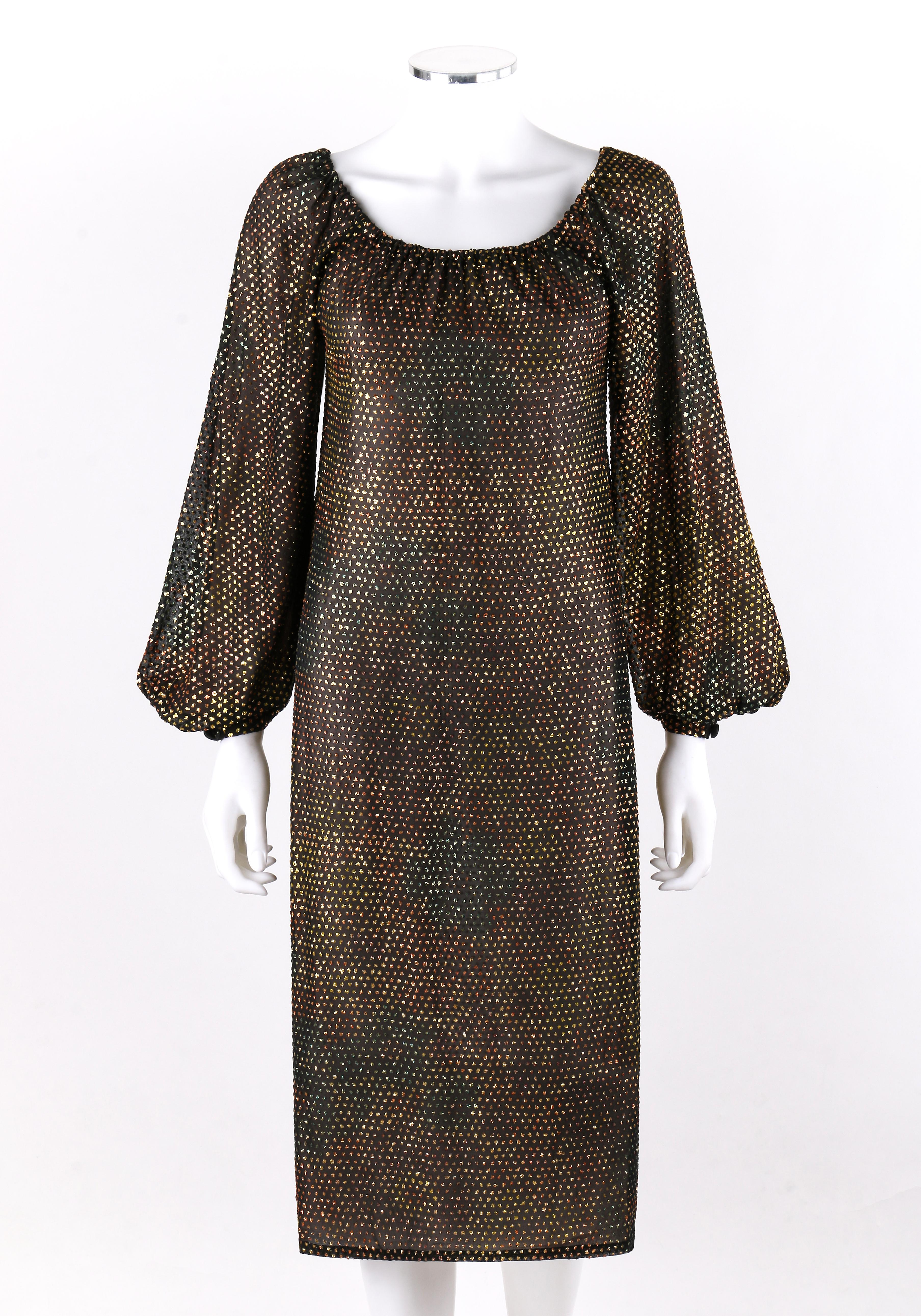 GIVENCHY HAUTE COUTURE c.1970 Robe droite noire à manches évasées et arc-en-ciel doré
 
Circa : 1970's
Label(s) : Givenchy ; Couture #53656
Créateur : Hubert de Givenchy
Style : Robe droite
Couleur(s) : Noir, nuances d'or, rouge, bleu, jaune