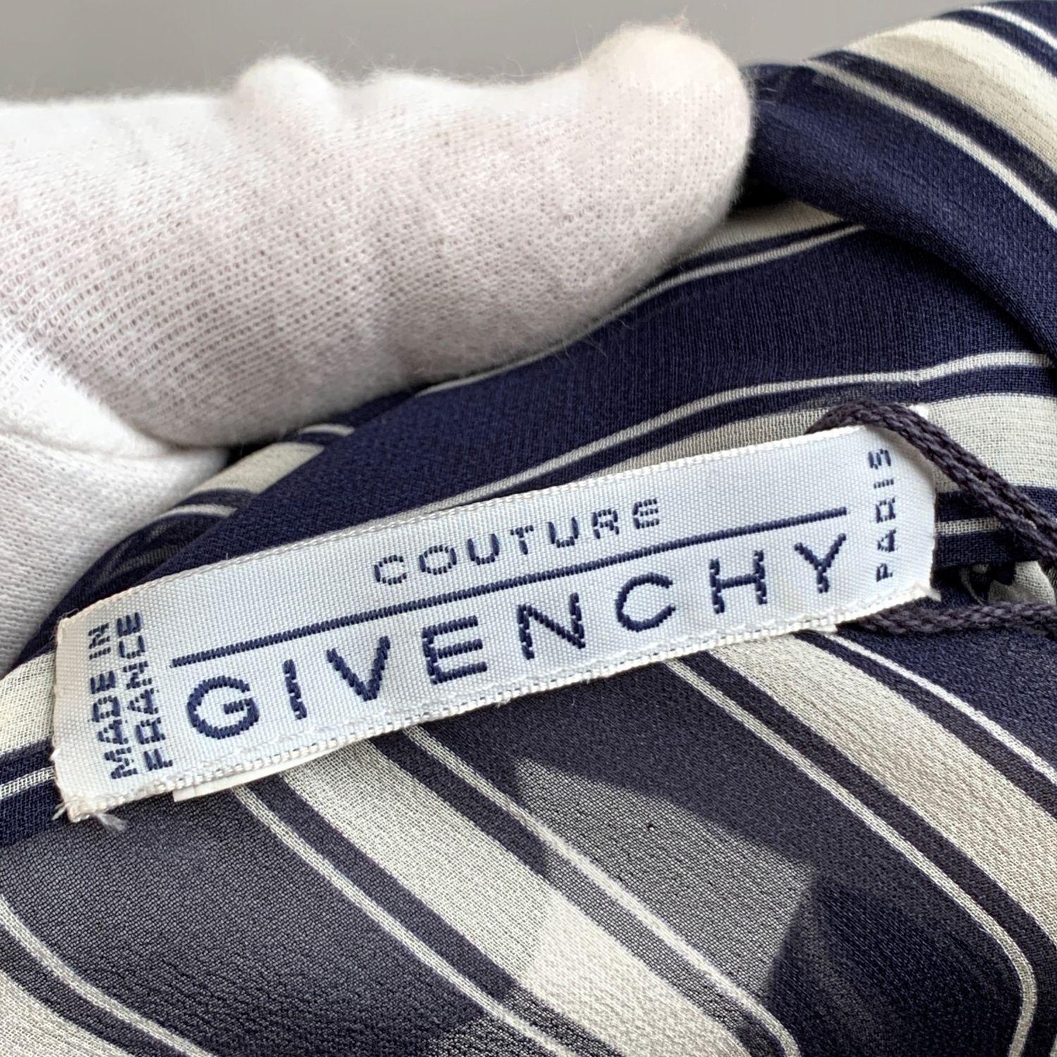 Vintage Givenchy Couture navy blue and white striped button down shirt in pure chiffon silk. It features pussybow detailing on the neckline, button closure on the front , long sleeve styling with zipped cuffs. Semi-sheer fabric. Composition:100%