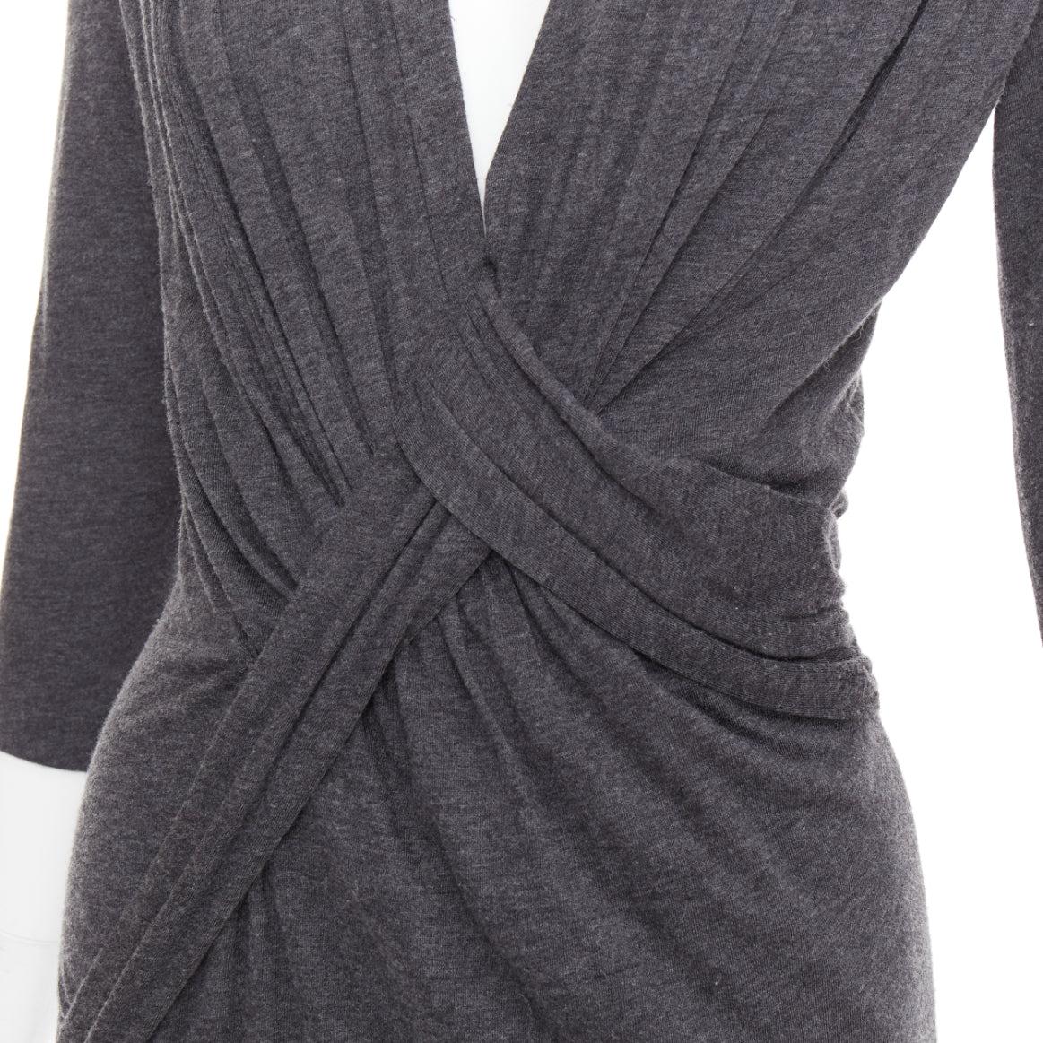 GIVENCHY dark grey lyocell cashmere deep V ruched draped mini dress M
Reference: CC/A00489
Brand: Givenchy
Designer: Riccardo Tisci
Material: Lyocell, Cashmere
Color: Grey
Pattern: Solid
Closure: Slip On
Extra Details: Plunge neckline.
Made in: